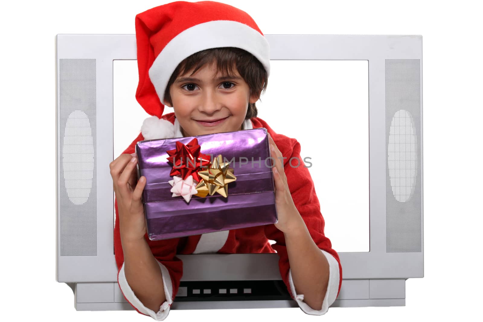 Little boy dressed as Santa escaping from television set
