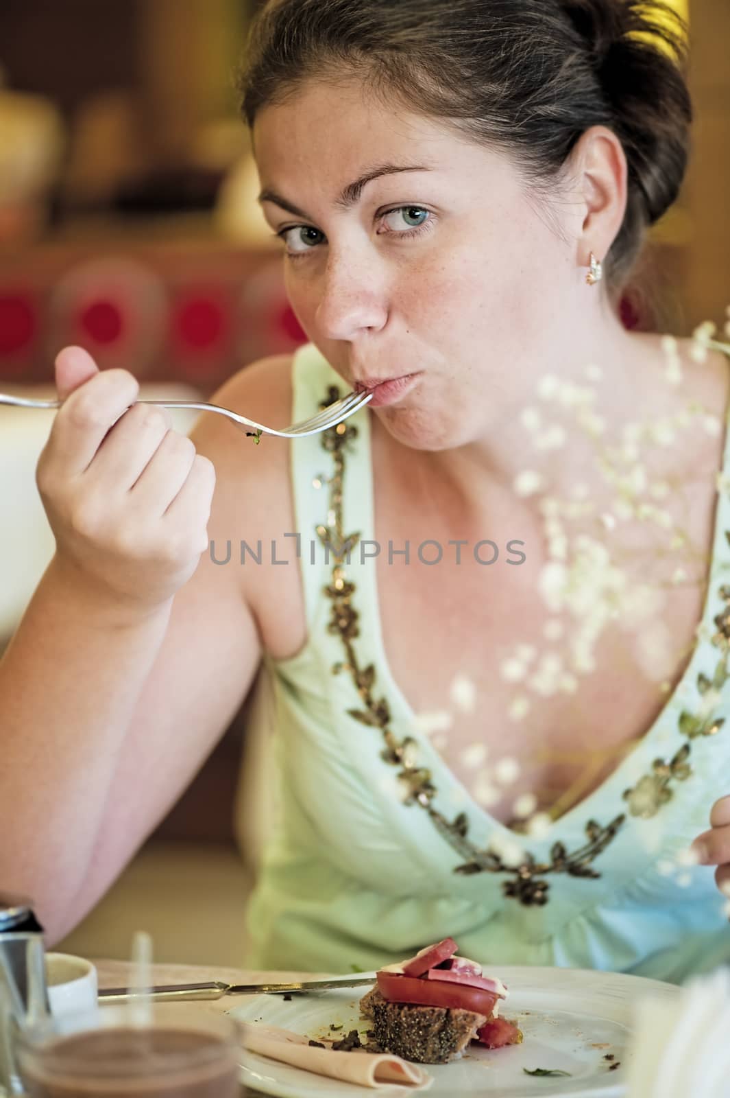 A girl with an appetite for eating dessert