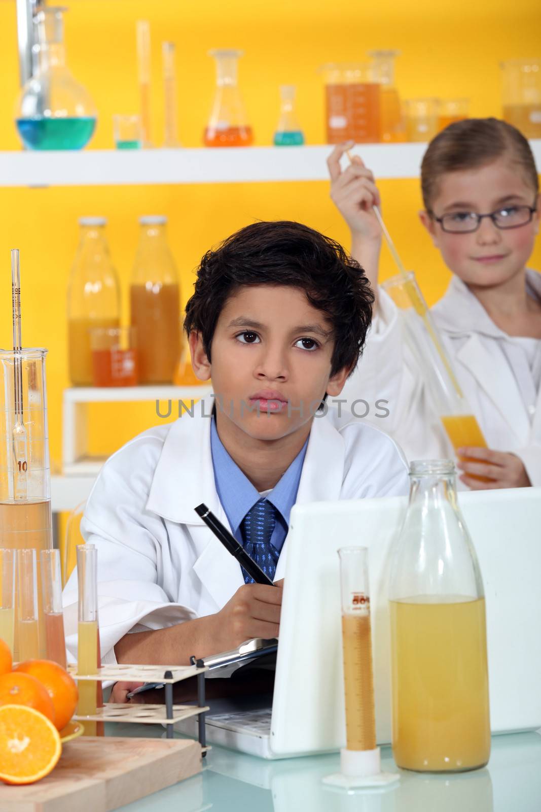 Kids performing science experiment