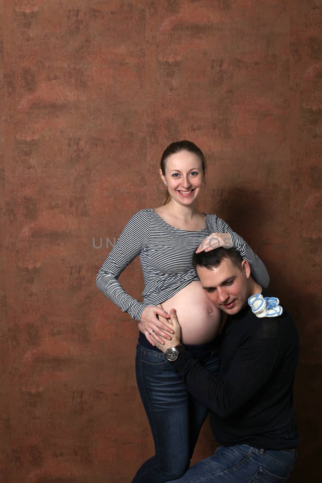 Young couple family pregnant by andersonrise