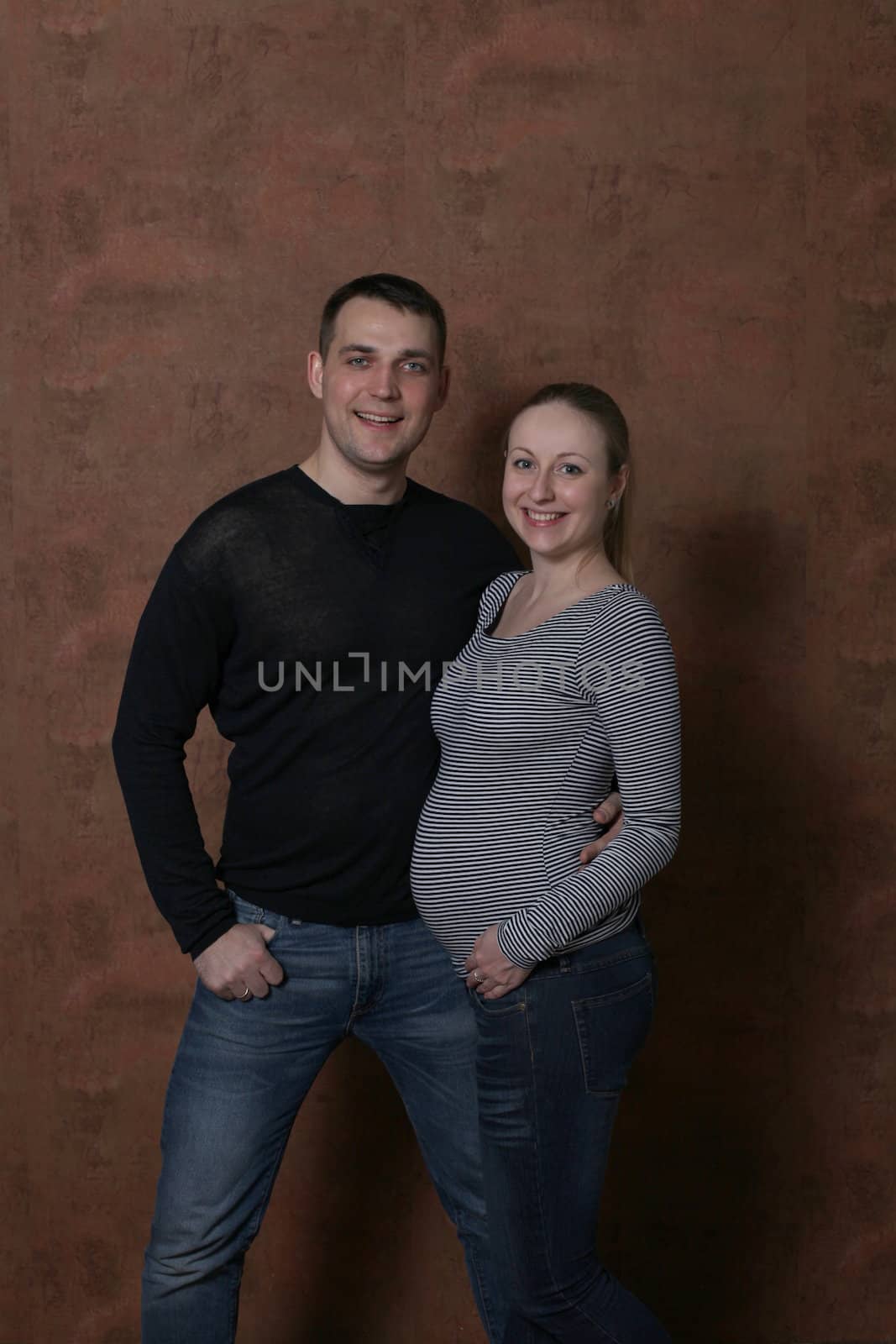 Young couple family pregnant by andersonrise