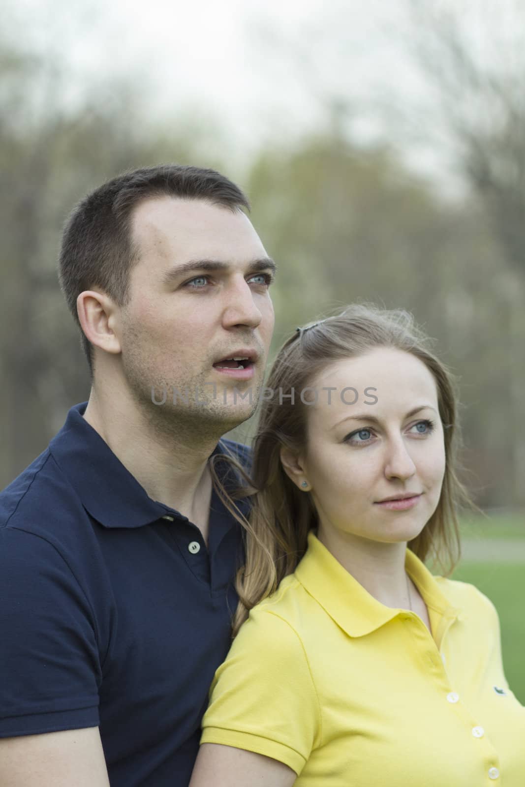 Portrait of love couple embracing outdoor