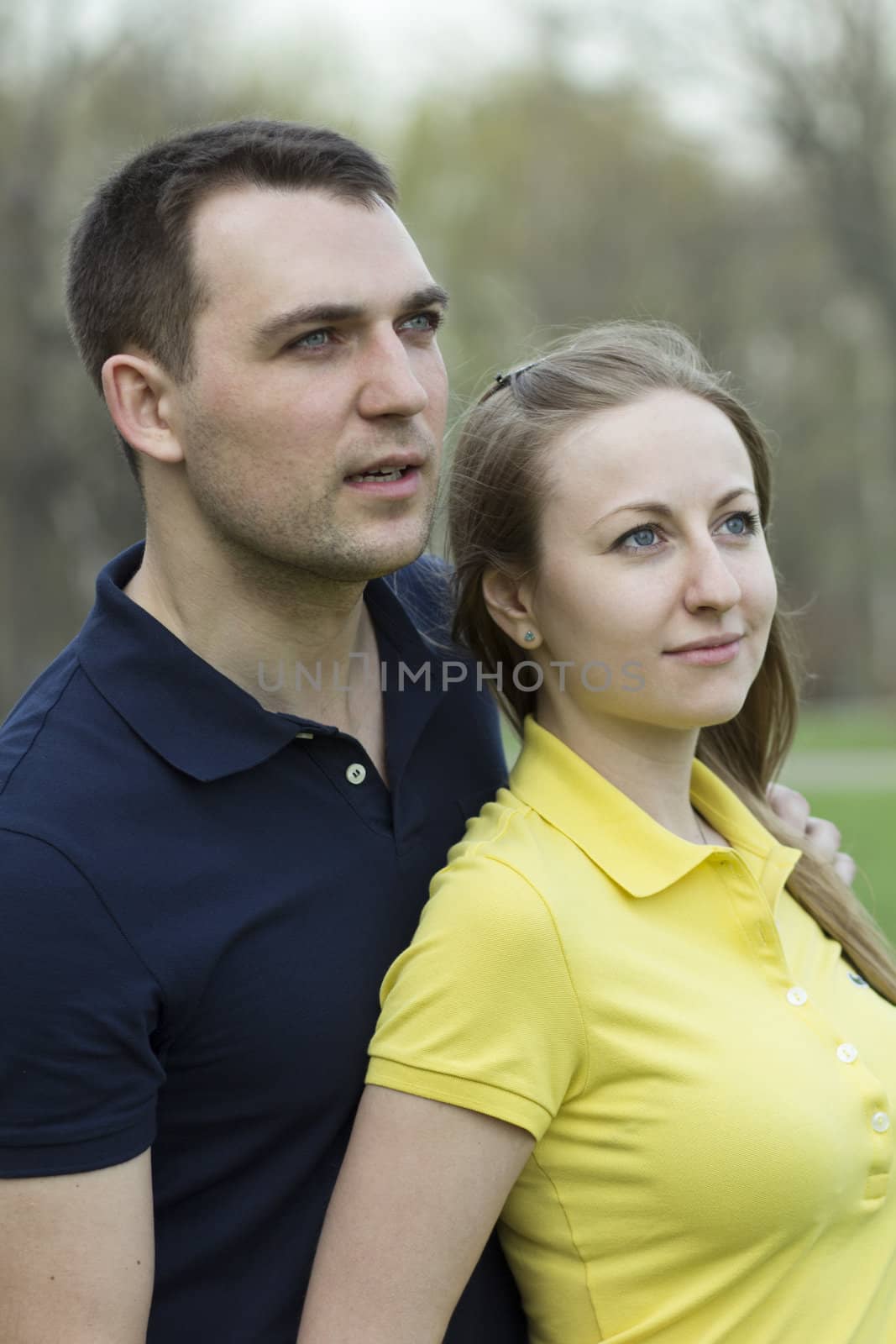 Portrait of love couple embracing outdoor