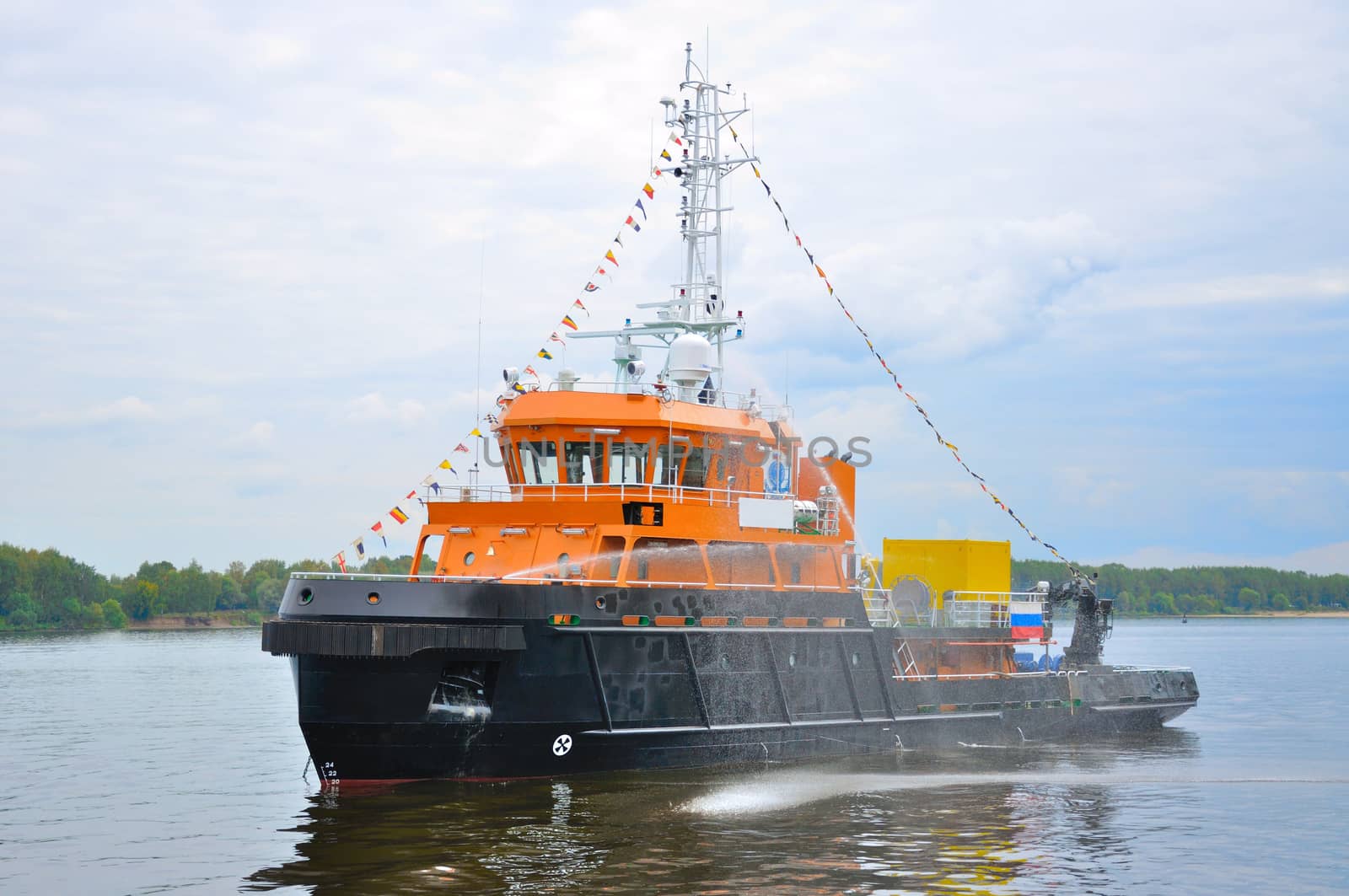 Black-orange ship in Volga river, Yaroslavl, Russia