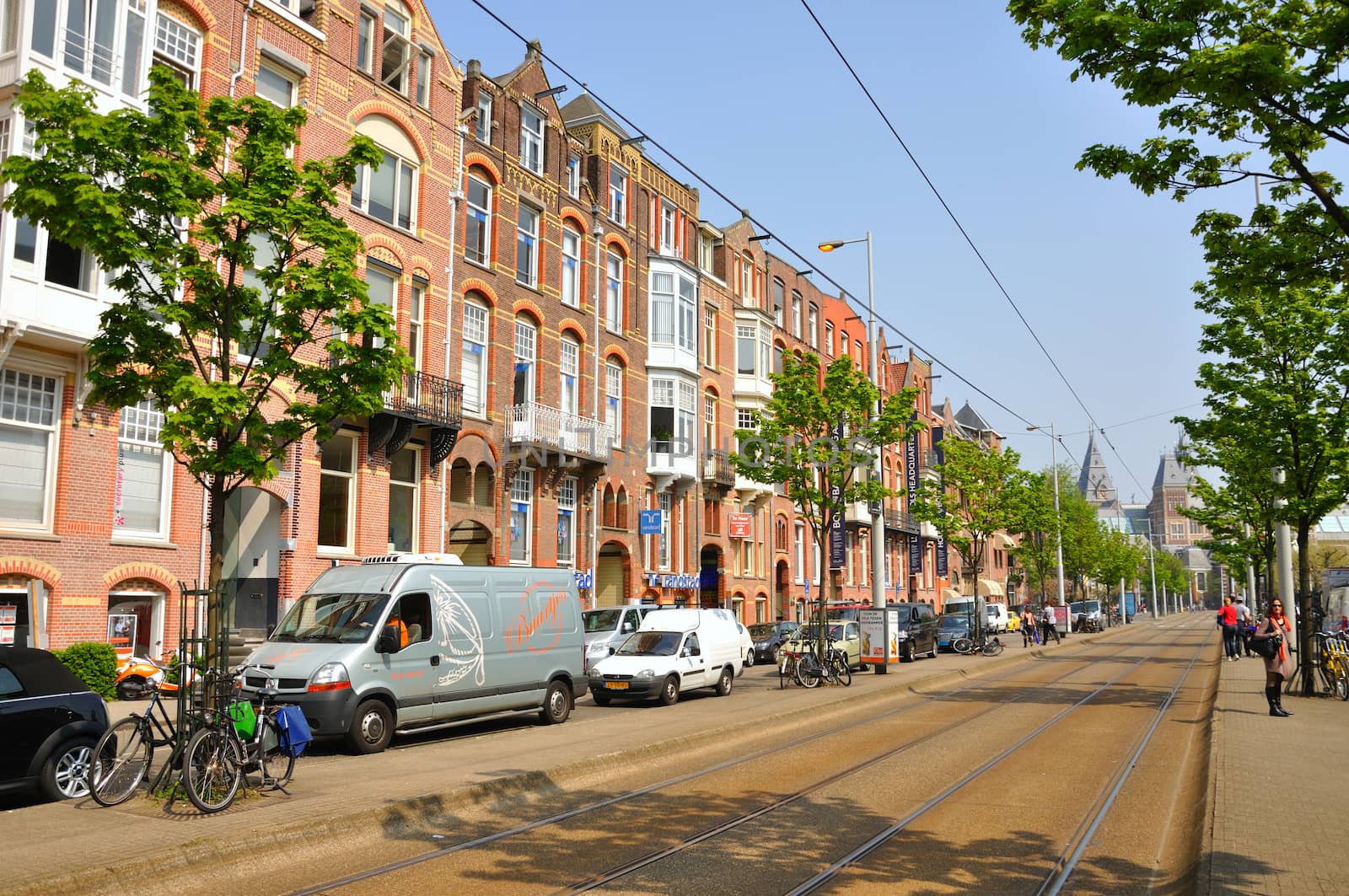 Beautiful street with cars and bikes in Amsterdam, Holland (Netherlands)