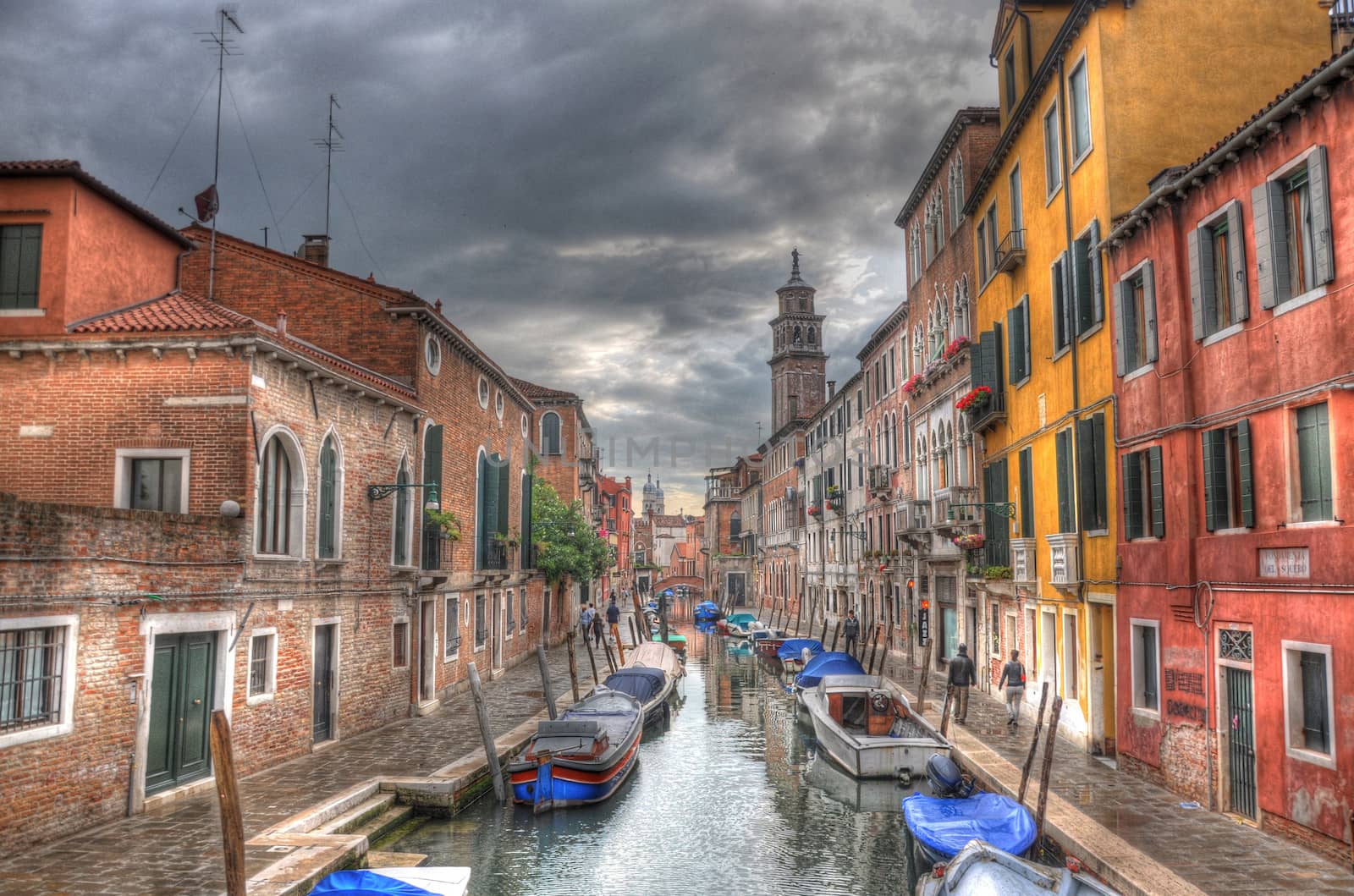 Canal in Venice with ancient houses, and boats, Venice, Italy (HDR)
