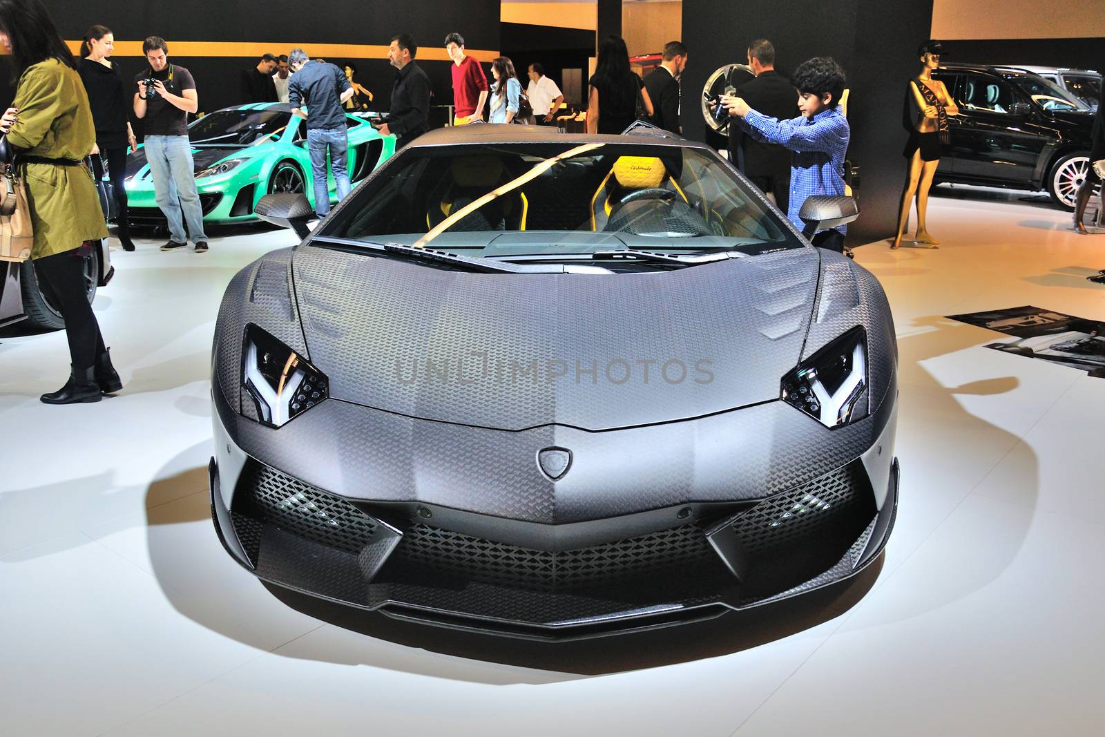 FRANKFURT - SEPT 14: Lamborghini Aventador Carbonado by Mansory presented as world premiere at the 65th IAA (Internationale Automobil Ausstellung) on September 14, 2013 in Frankfurt, Germany