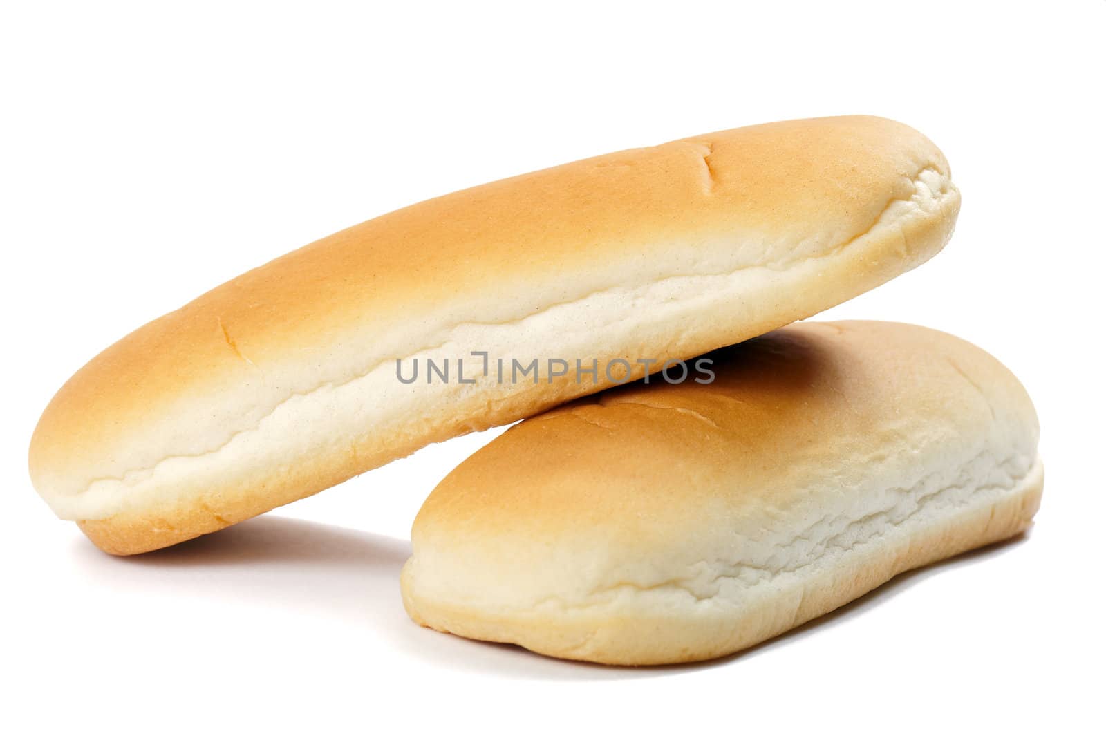 Two appetizing fresh hot dog buns on white background