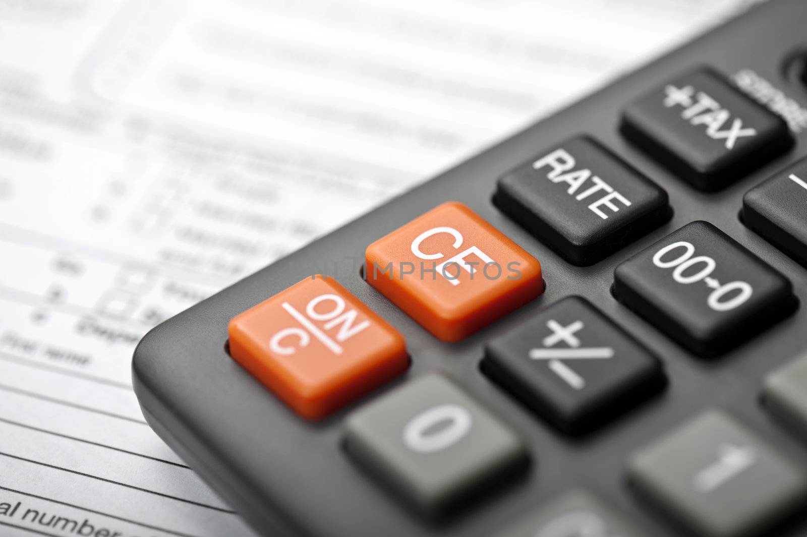 Closeup of a Calculator and tax form