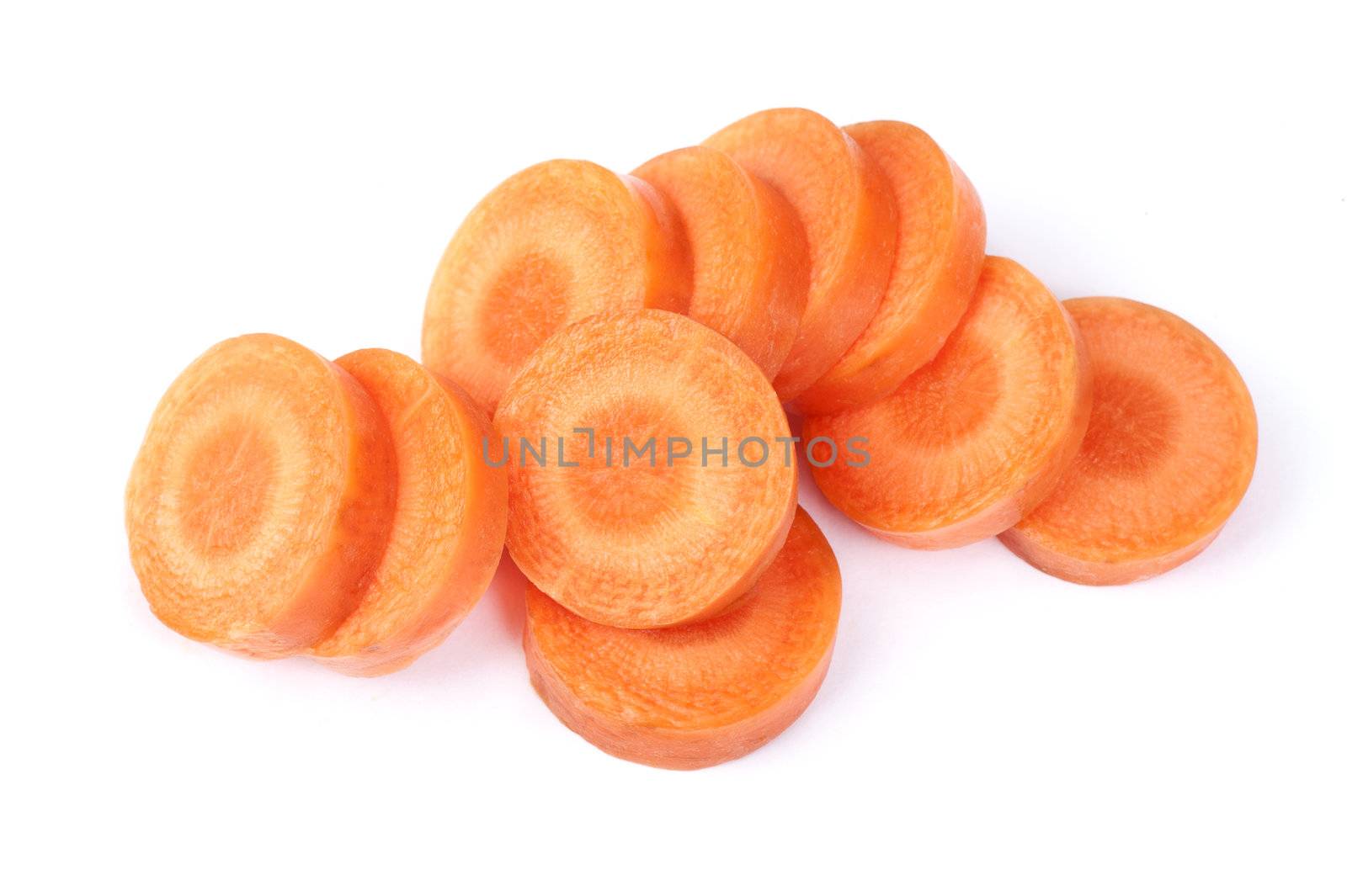 Ripe and juicy chopped carrot on white background