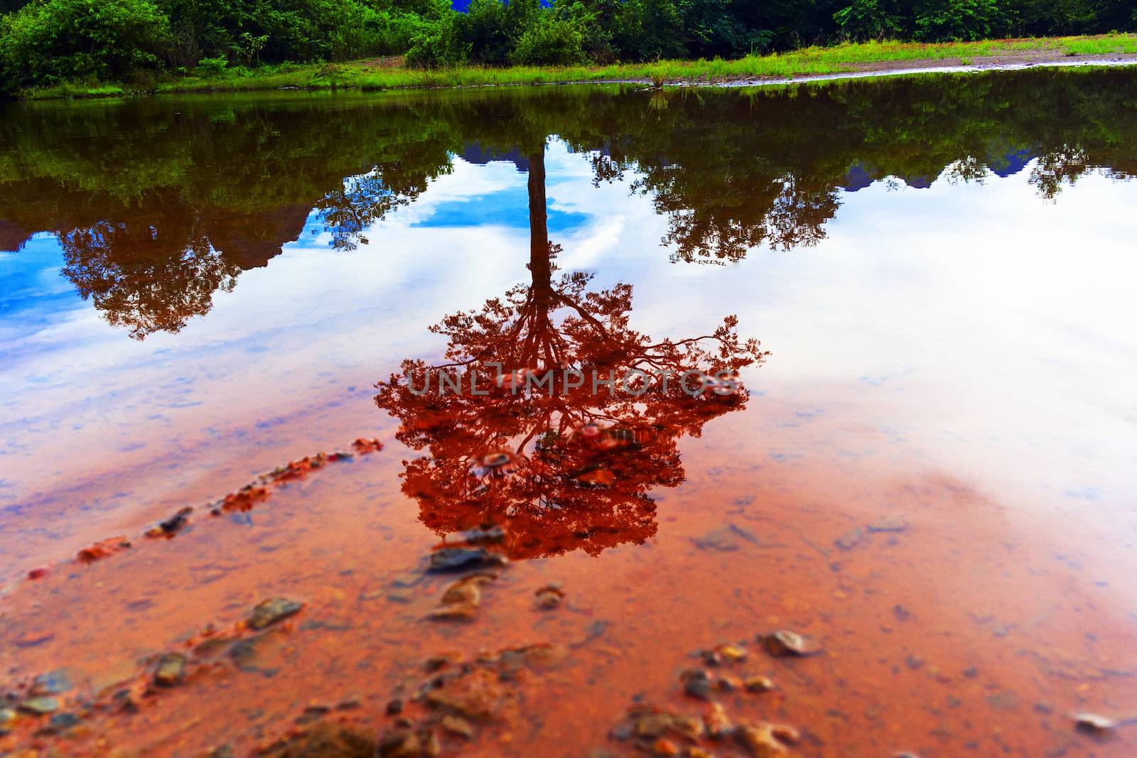 Reflections of Laos. Clay Lao Rivers. Khammouane province.