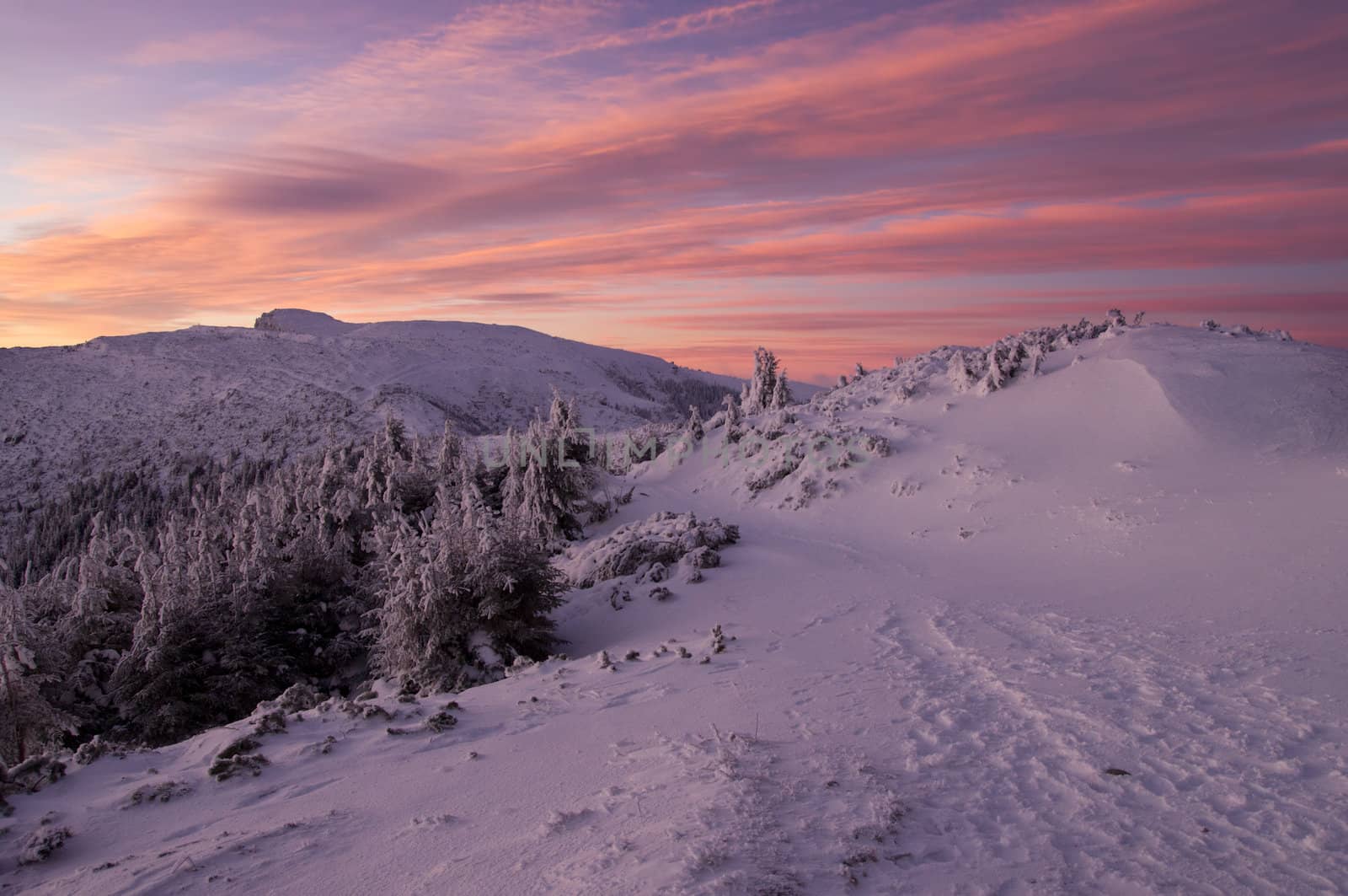 Mountain sunset landscape in winter, Romanian Carpathians
