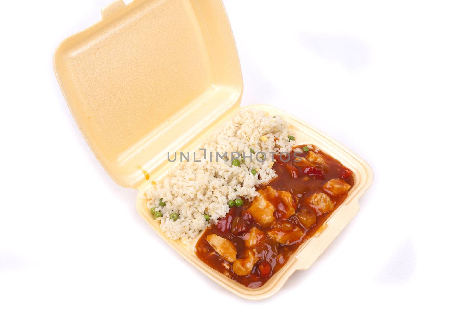 Closeup photo of take away chinese sweet and sour chicken with rice.