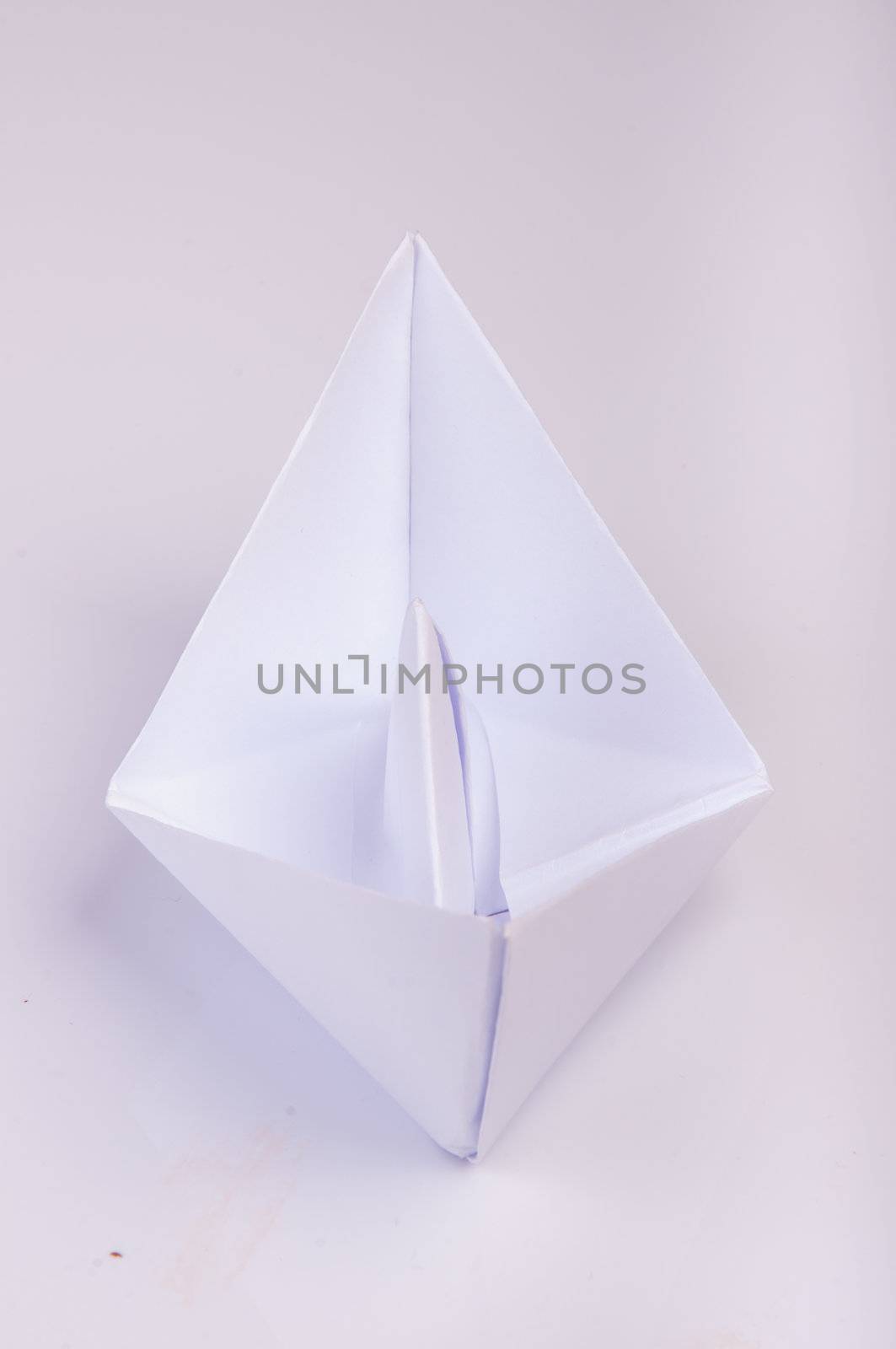 An image of white origami boat 