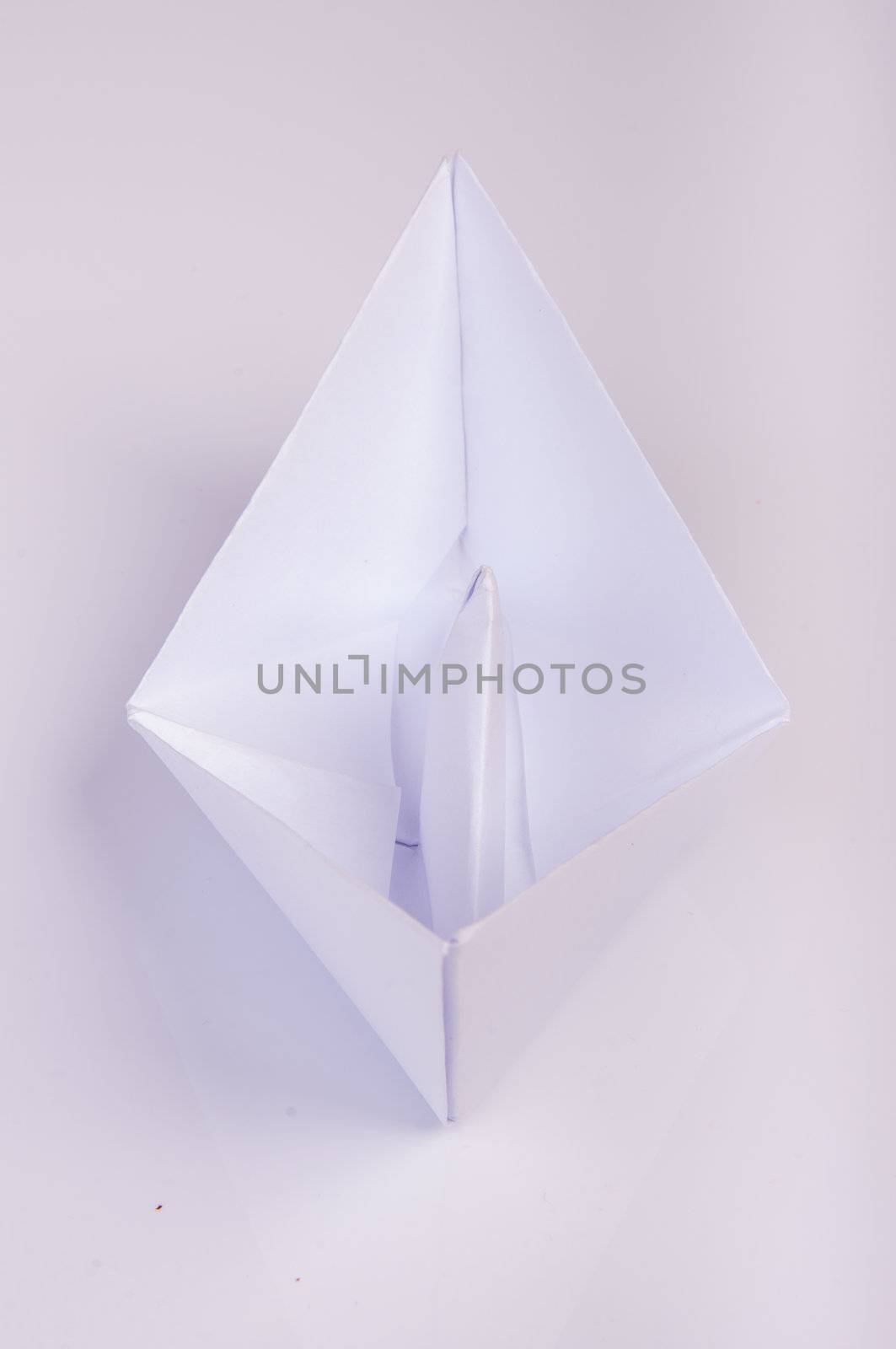 An image of white origami boat 