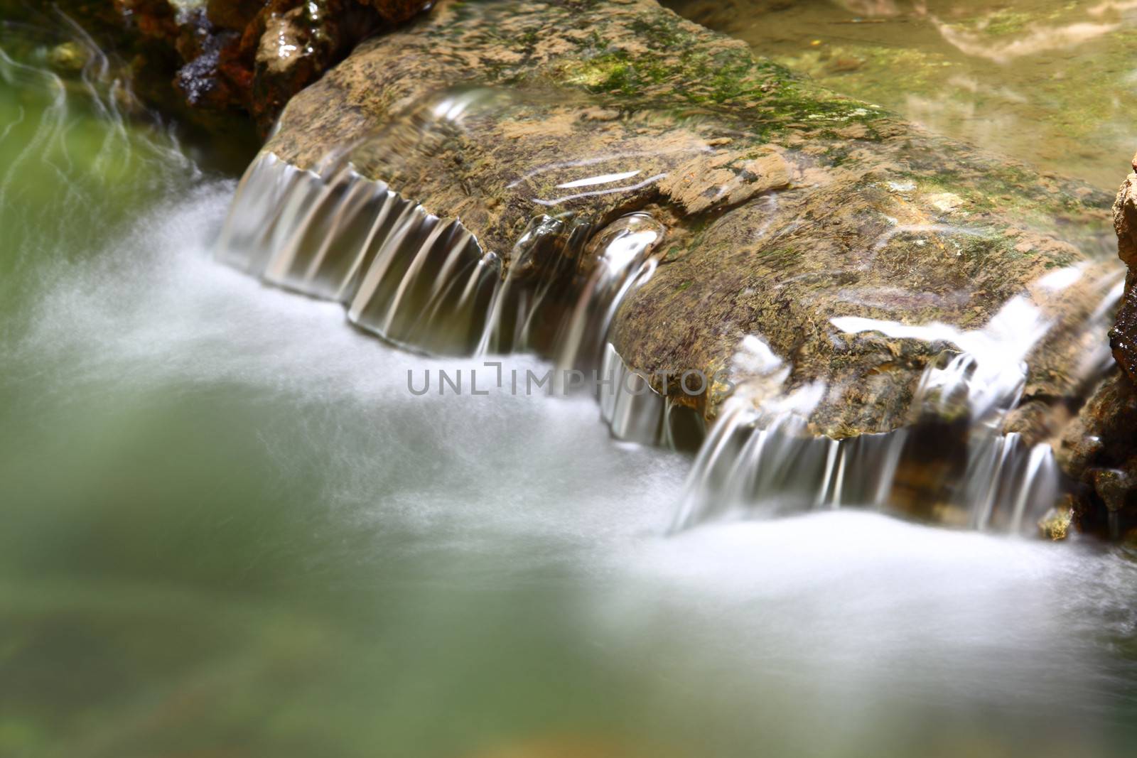 Beautiful waterfall in fish pond