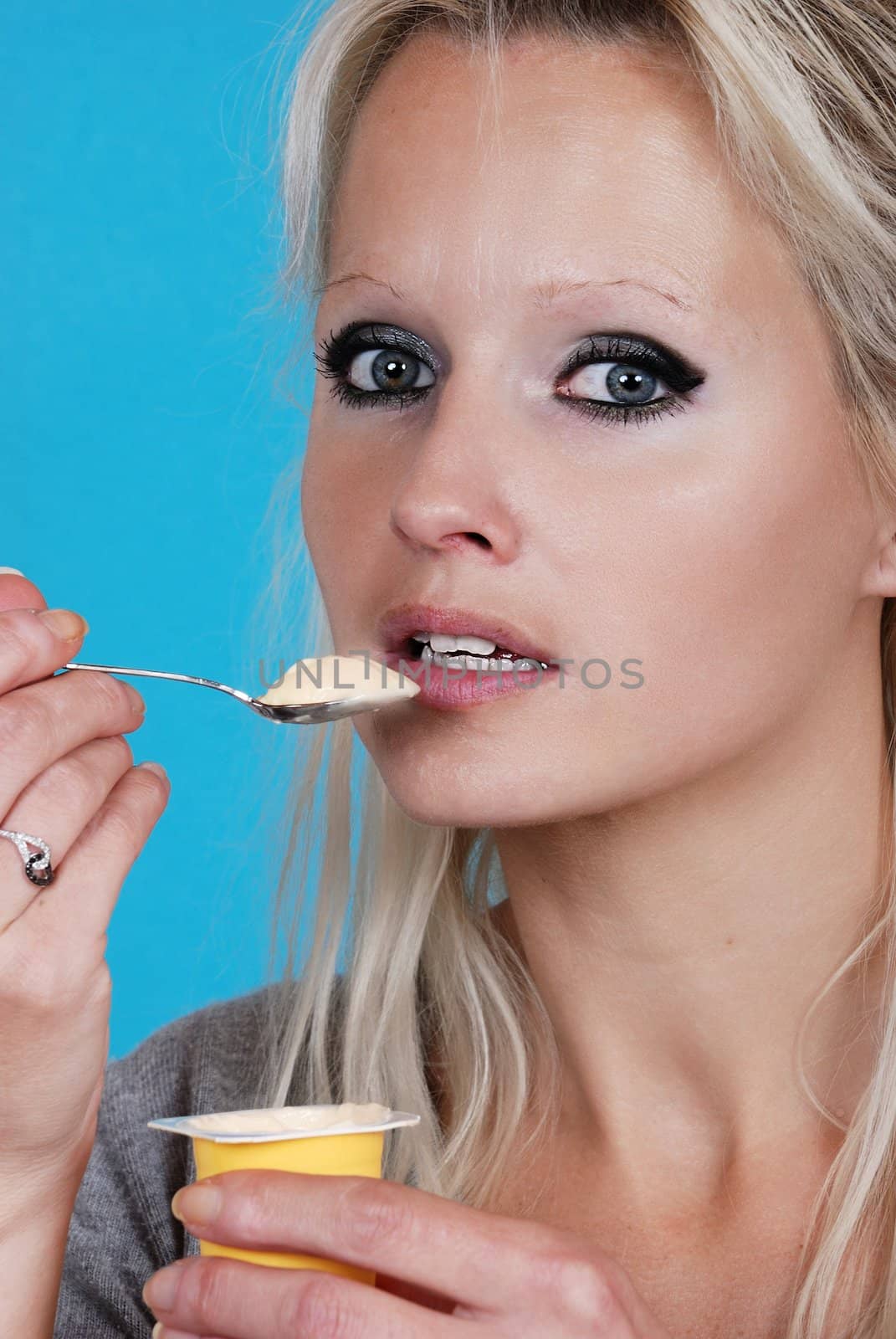 young woman eatin cream