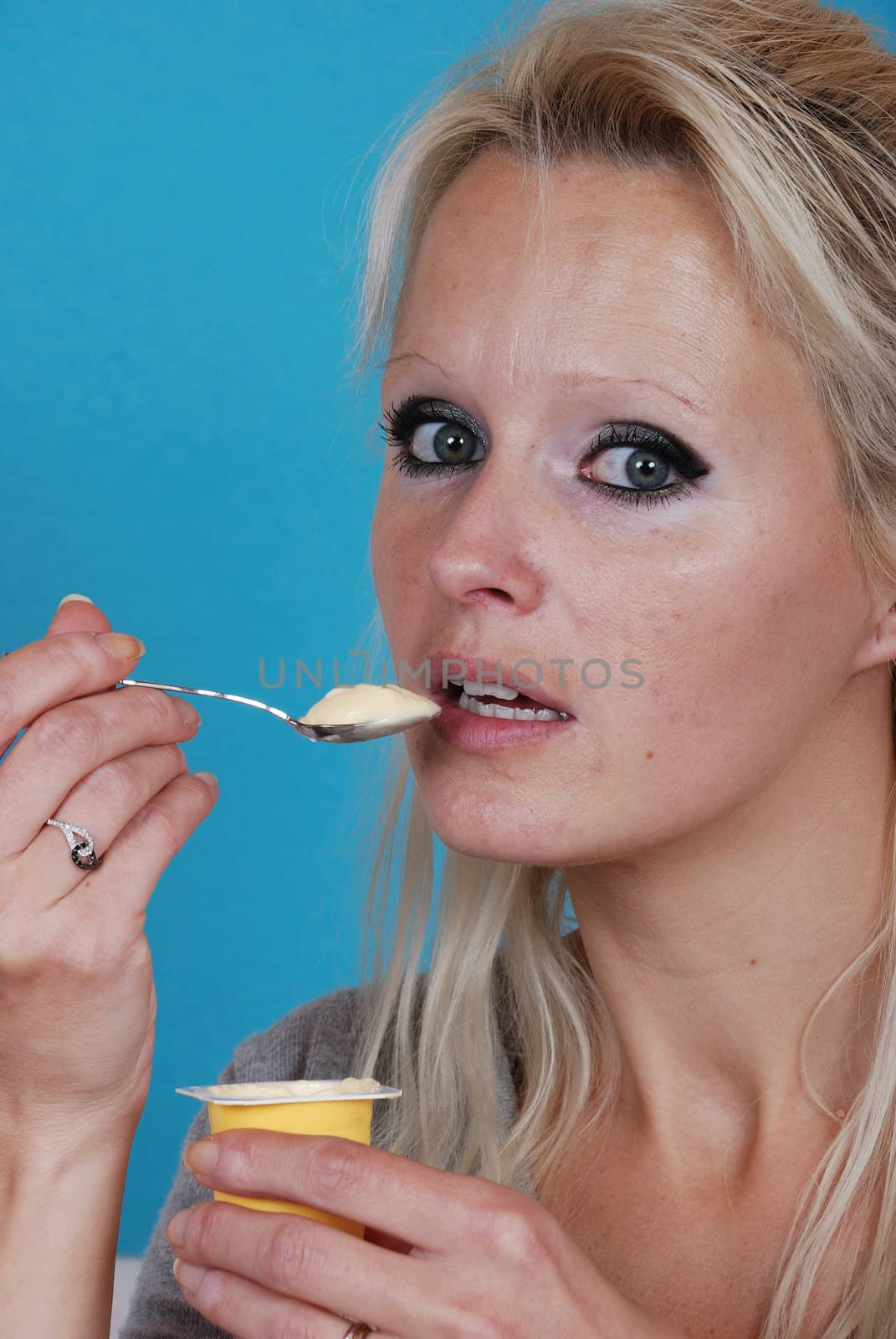 young woman eatin cream