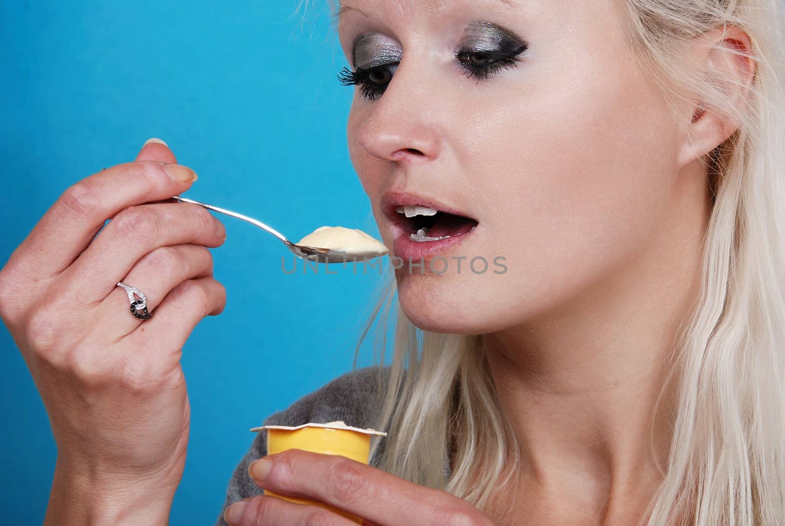 young woman eatin cream