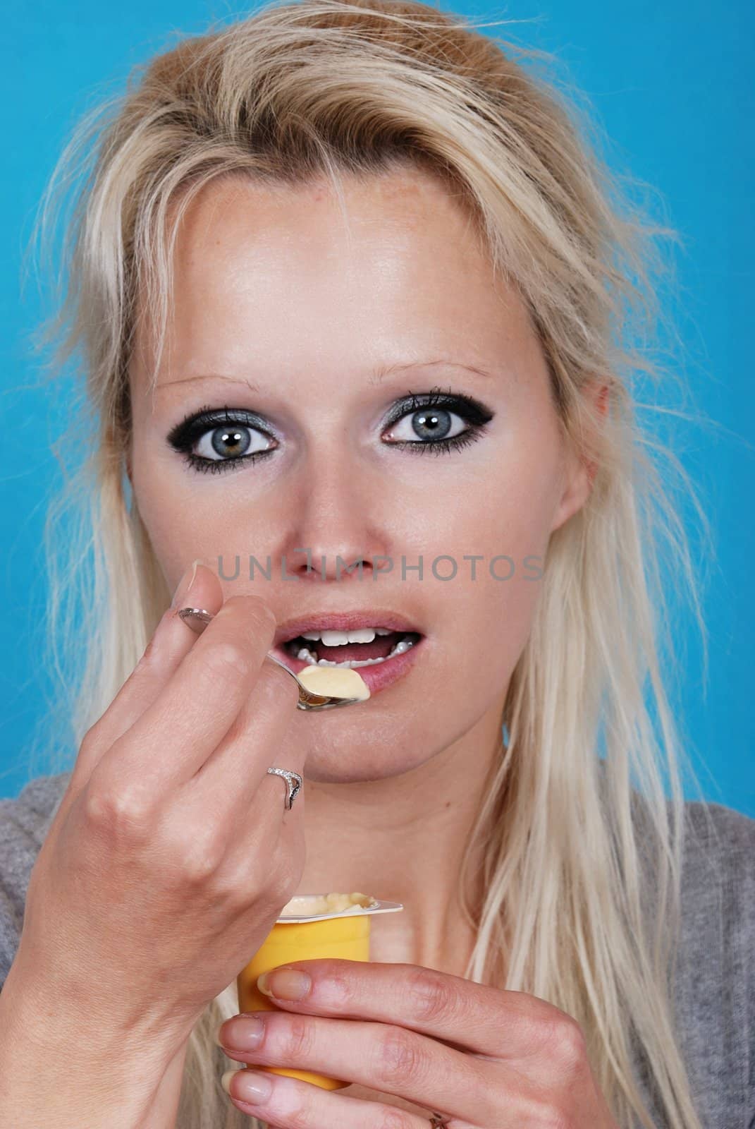 young woman eatin cream