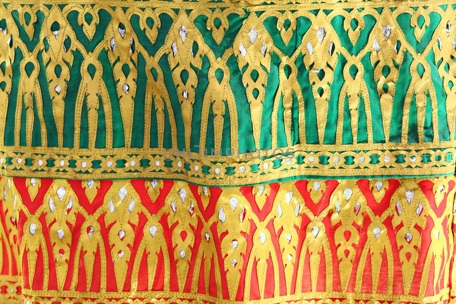 Thai style cloth decoration on tiered umbrella