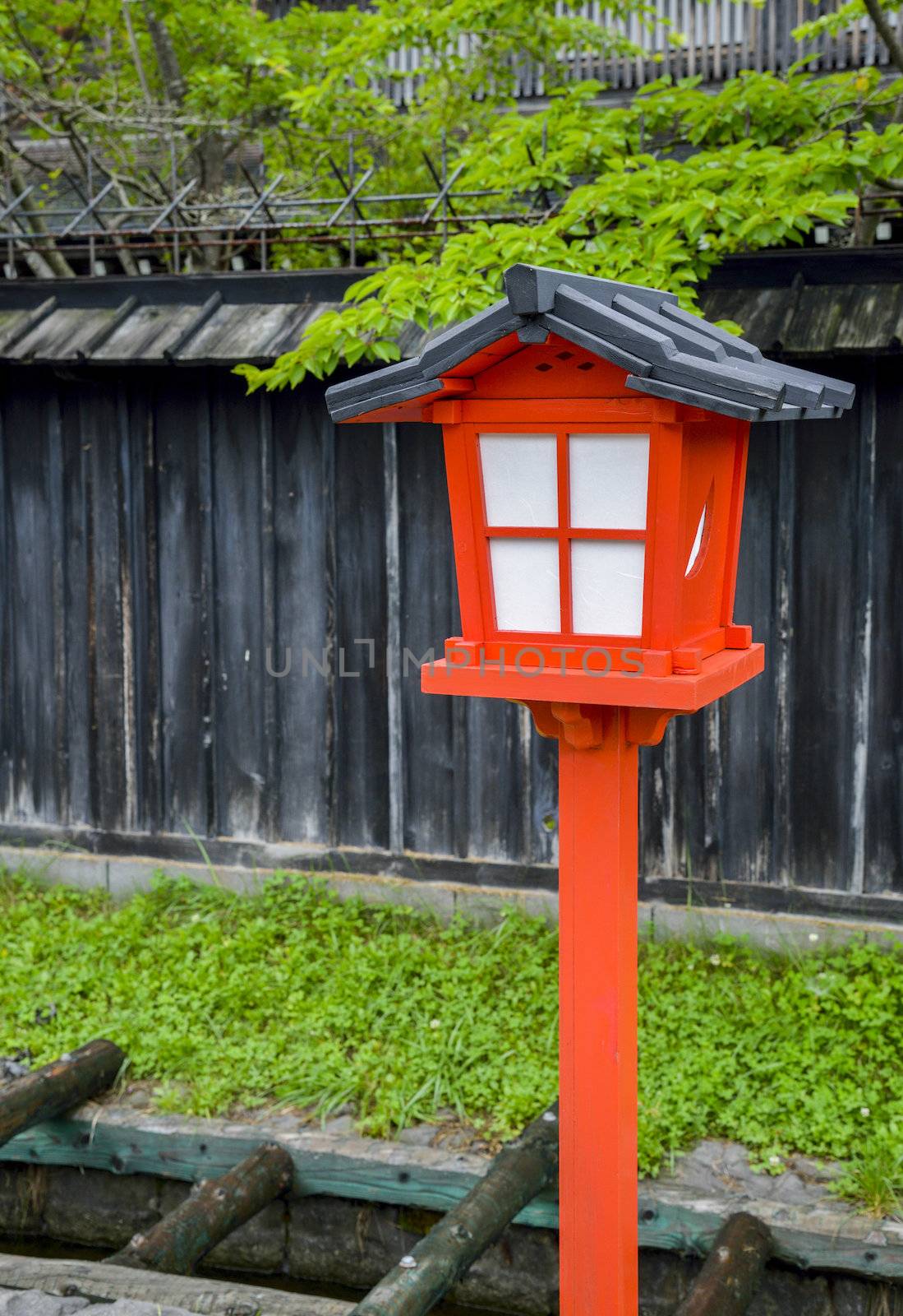 Red lamp in Japanese style by gjeerawut