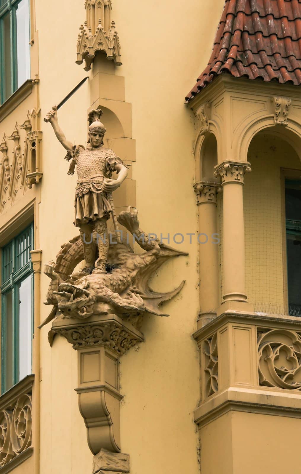 Sculpture of St. George on the front of the house in Prague