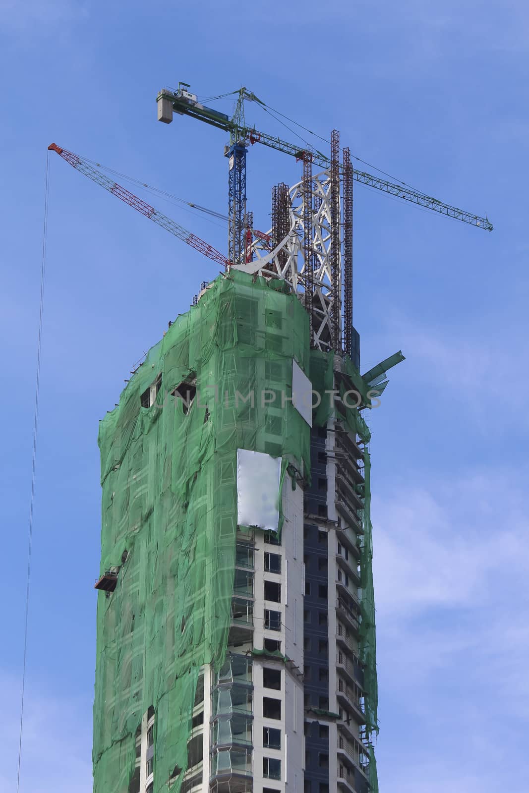 building construction with crane on top