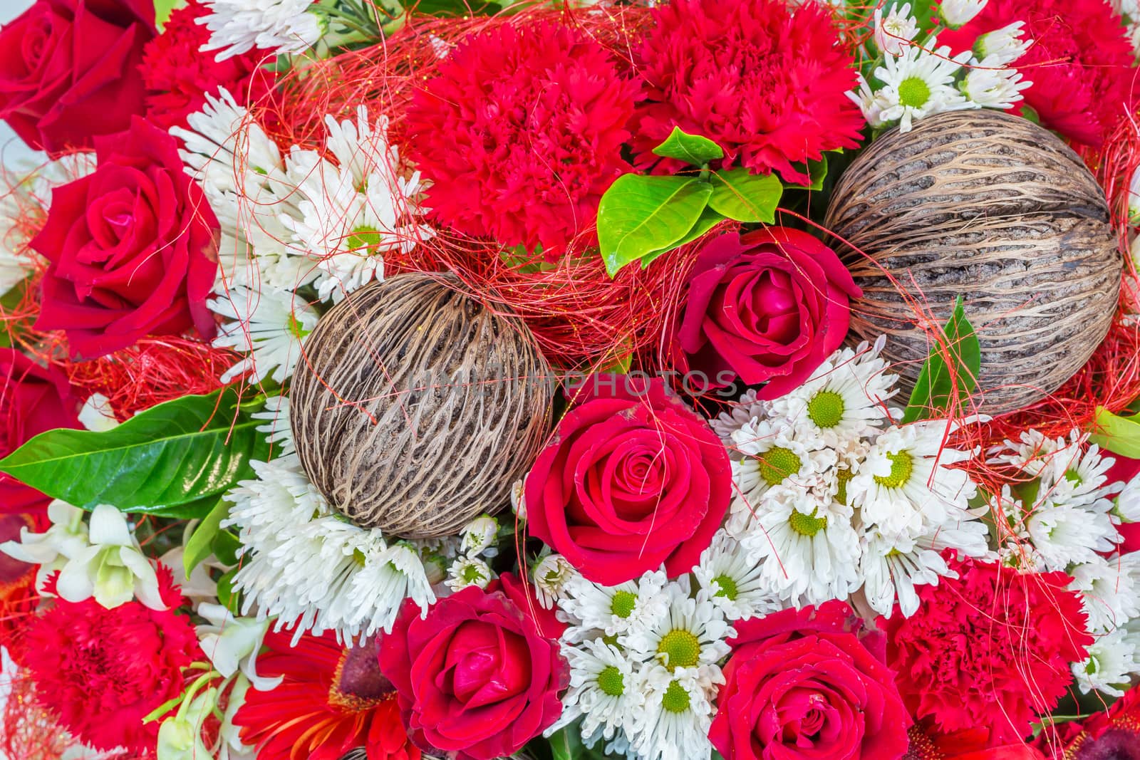 Flowers arrangement with red rose and carnation