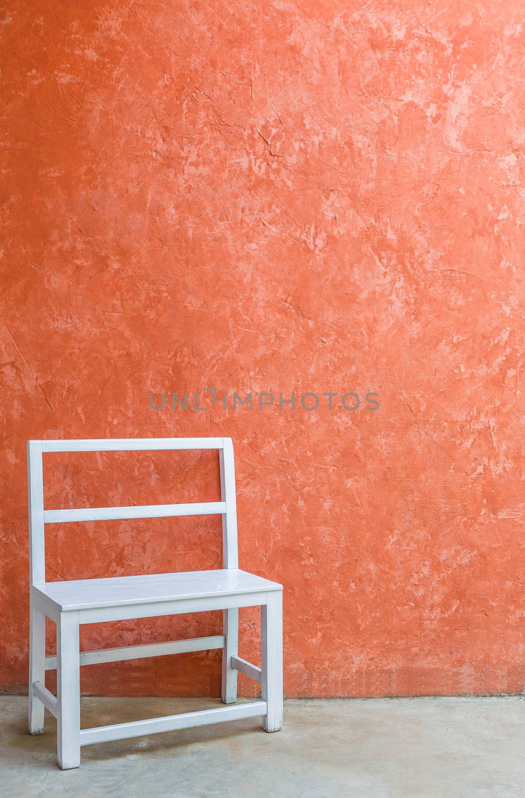 White chair and orange wall by smuay