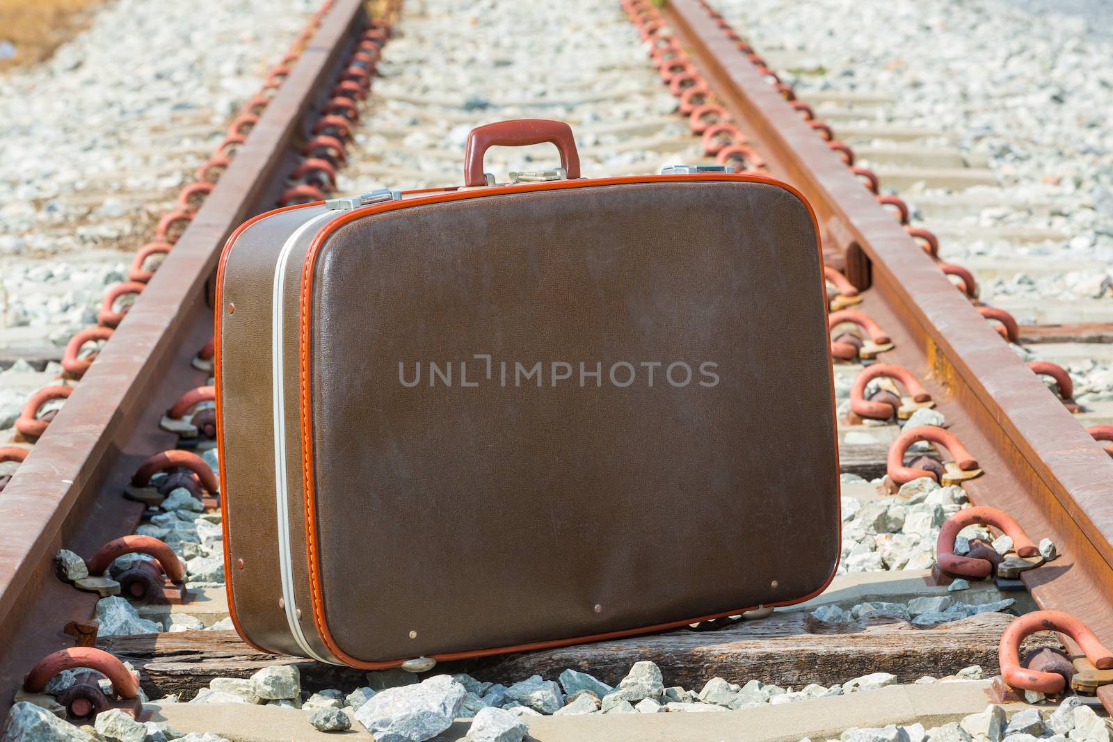 Traveling bag and railway for holiday journey