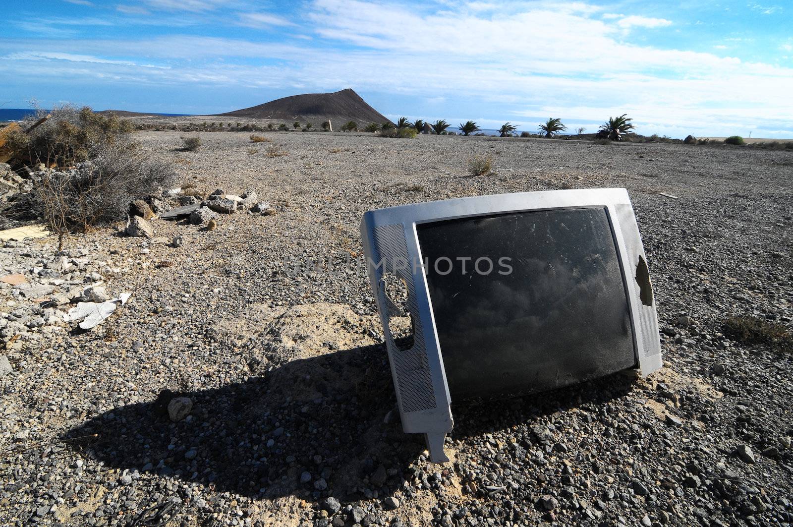 A Broken Gray Television Abandoned in the Desert