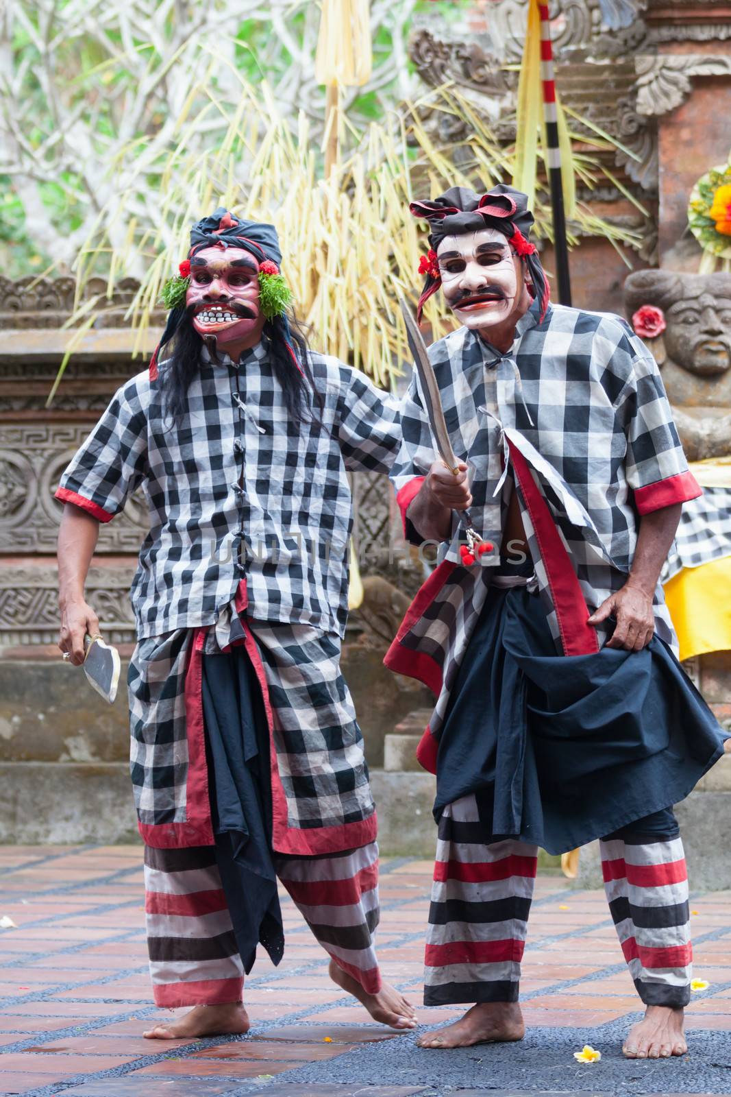 BALI - SEP 21: Barong and Kris Dance performs at Sahadewah, in Batubulan, Bali, Indonesia on Sep 21, 2012. This famous play represents an fight between good and bad gods.