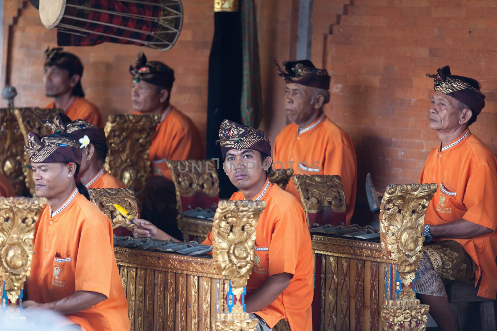 BALI - SEP 21: Musicians on Barong and Kris Dance performs at Sahadewah, in Batubulan, Bali, Indonesia on Sep 21, 2012. This famous play represents an fight between good and bad gods.