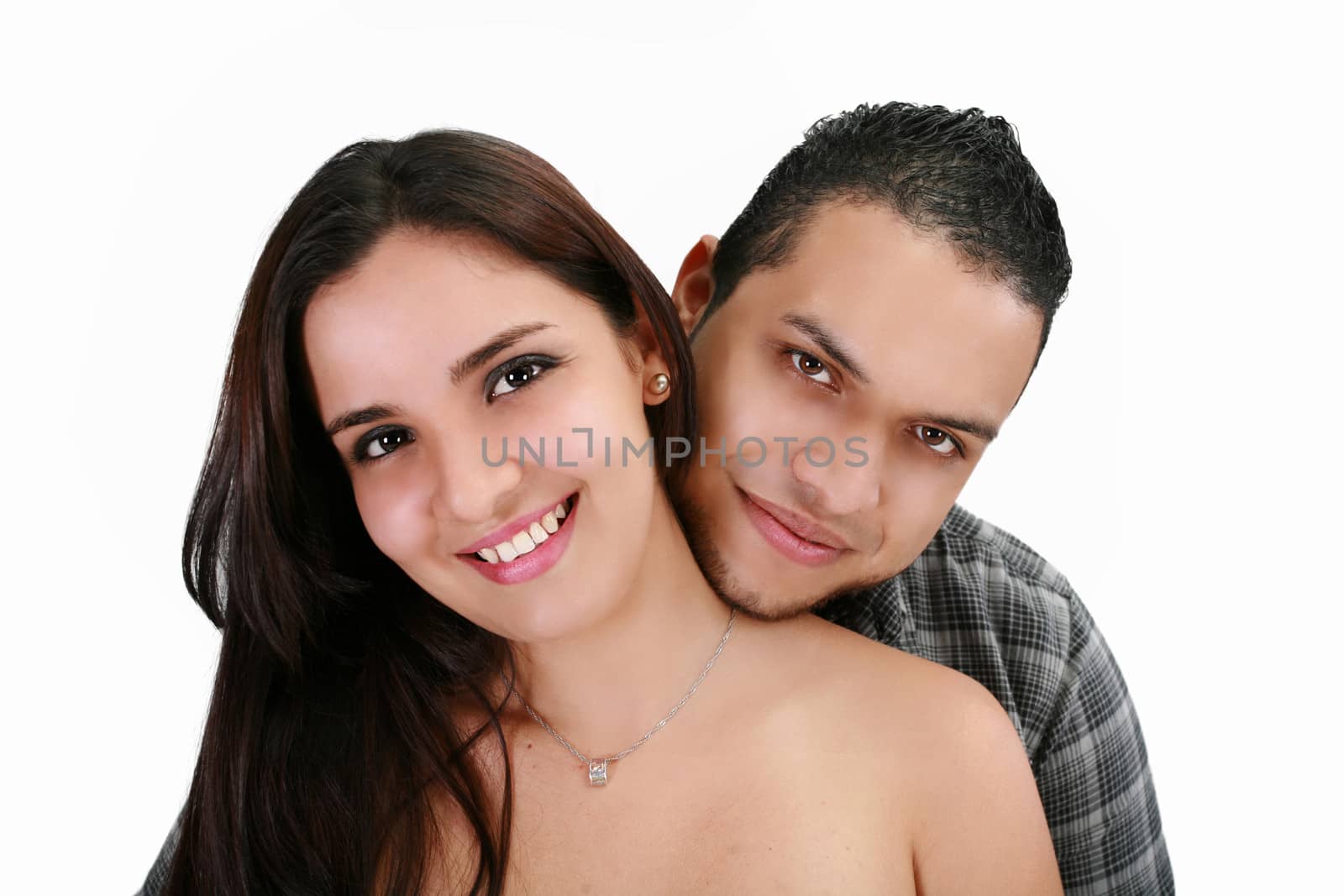 Happy smiling young latin couple isolated on white background