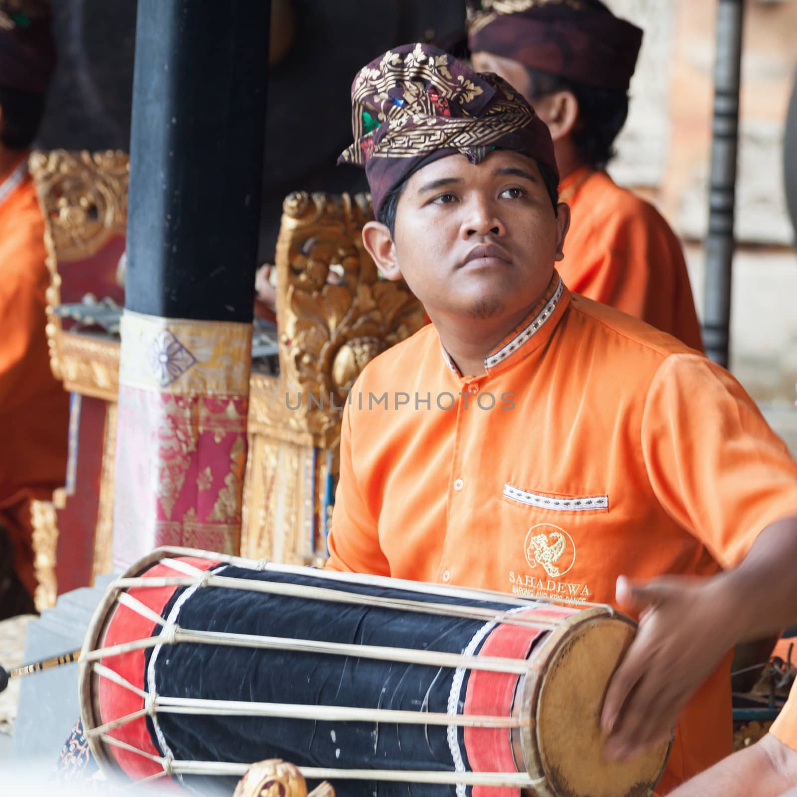 BALI - SEP 21: Musician on Barong and Kris Dance performs at Sahadewah, in Batubulan, Bali, Indonesia on Sep 21, 2012. This famous play represents an fight between good and bad gods.