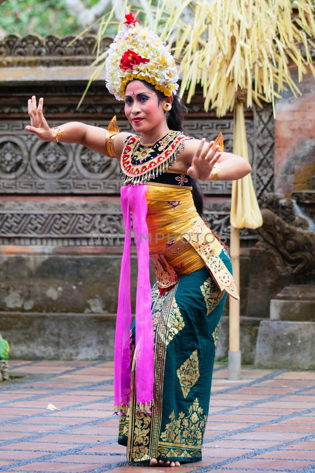 BALI - SEP 21: Barong and Kris Dance performs at Sahadewah, in Batubulan, Bali, Indonesia on Sep 21, 2012. This famous play represents an fight between good and bad gods.