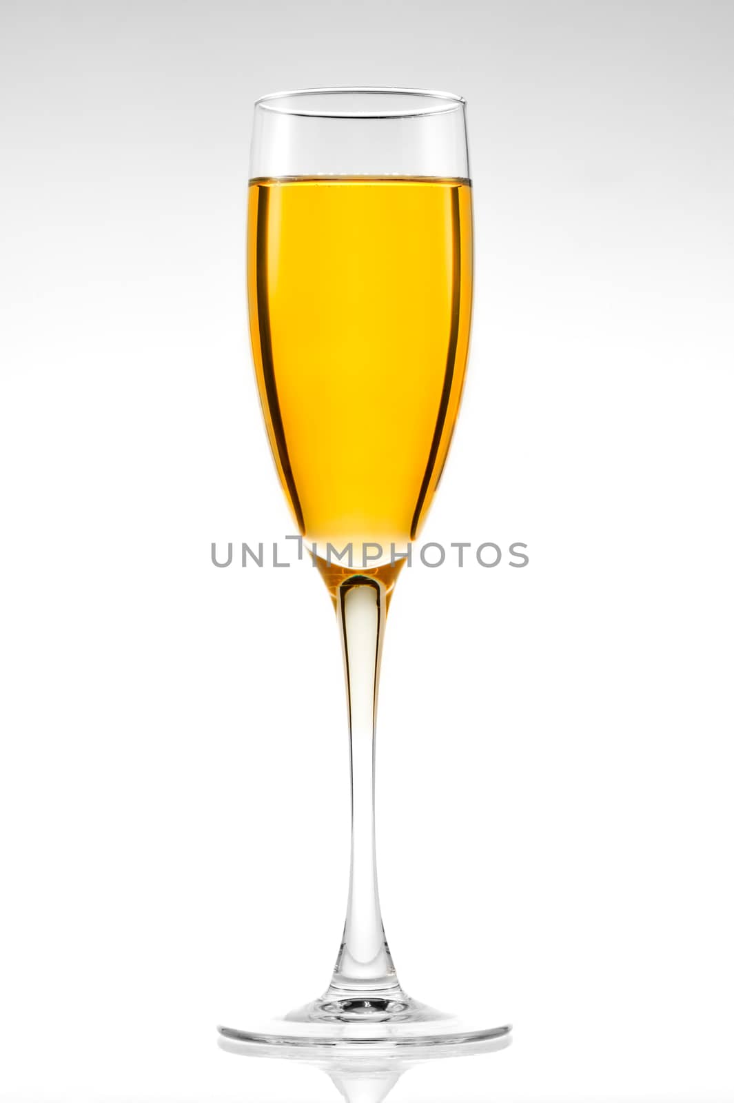 Glass of champagne on a white background by kosmsos111
