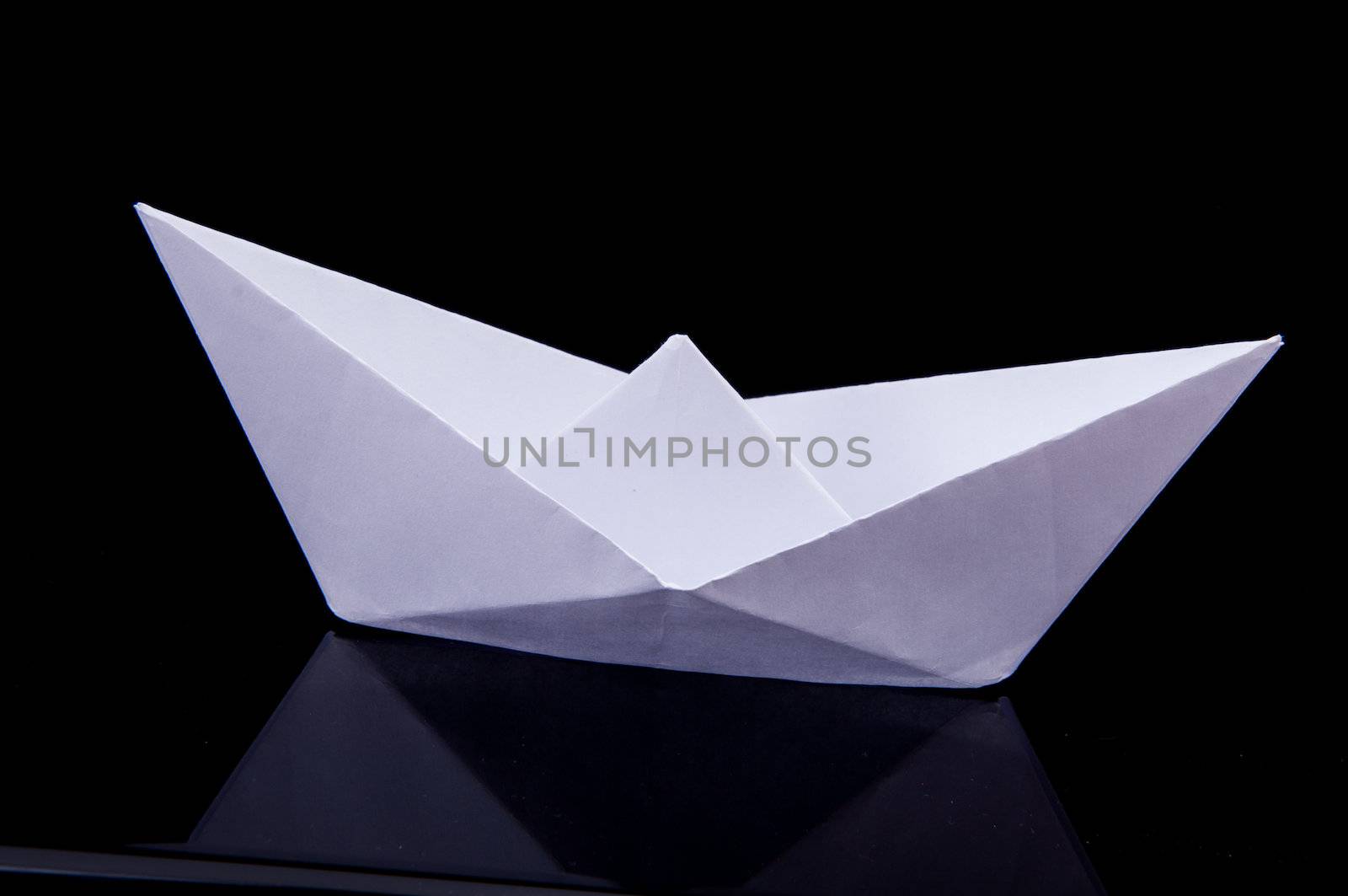An image of white origami boat 