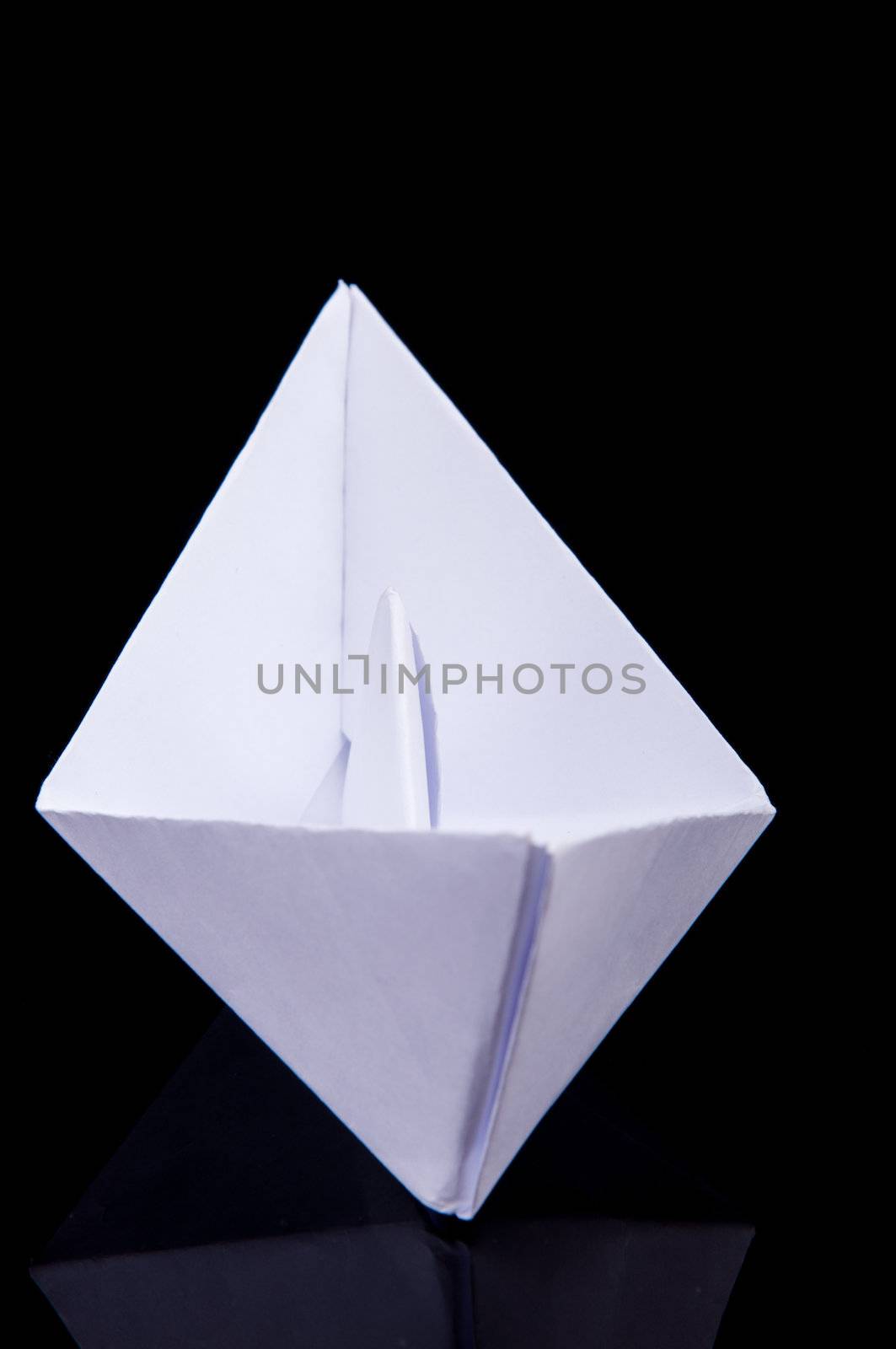 An image of white origami boat 