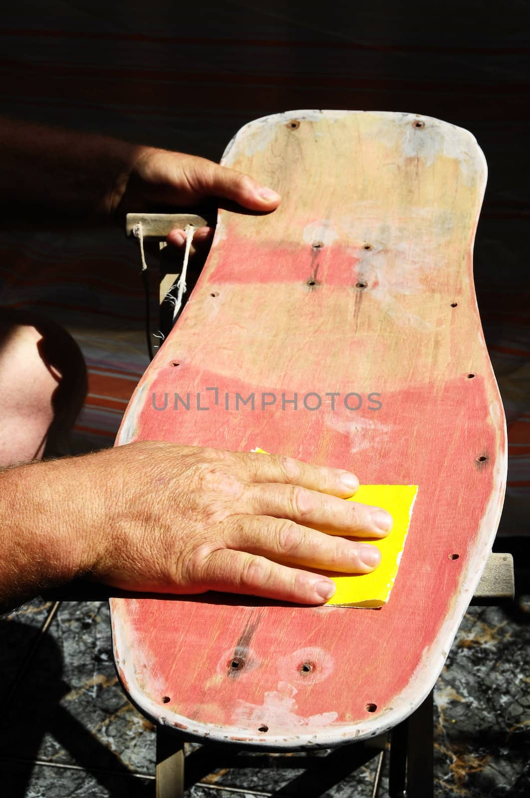 Restore an Old Skateboard with a Yellow Sandpaper