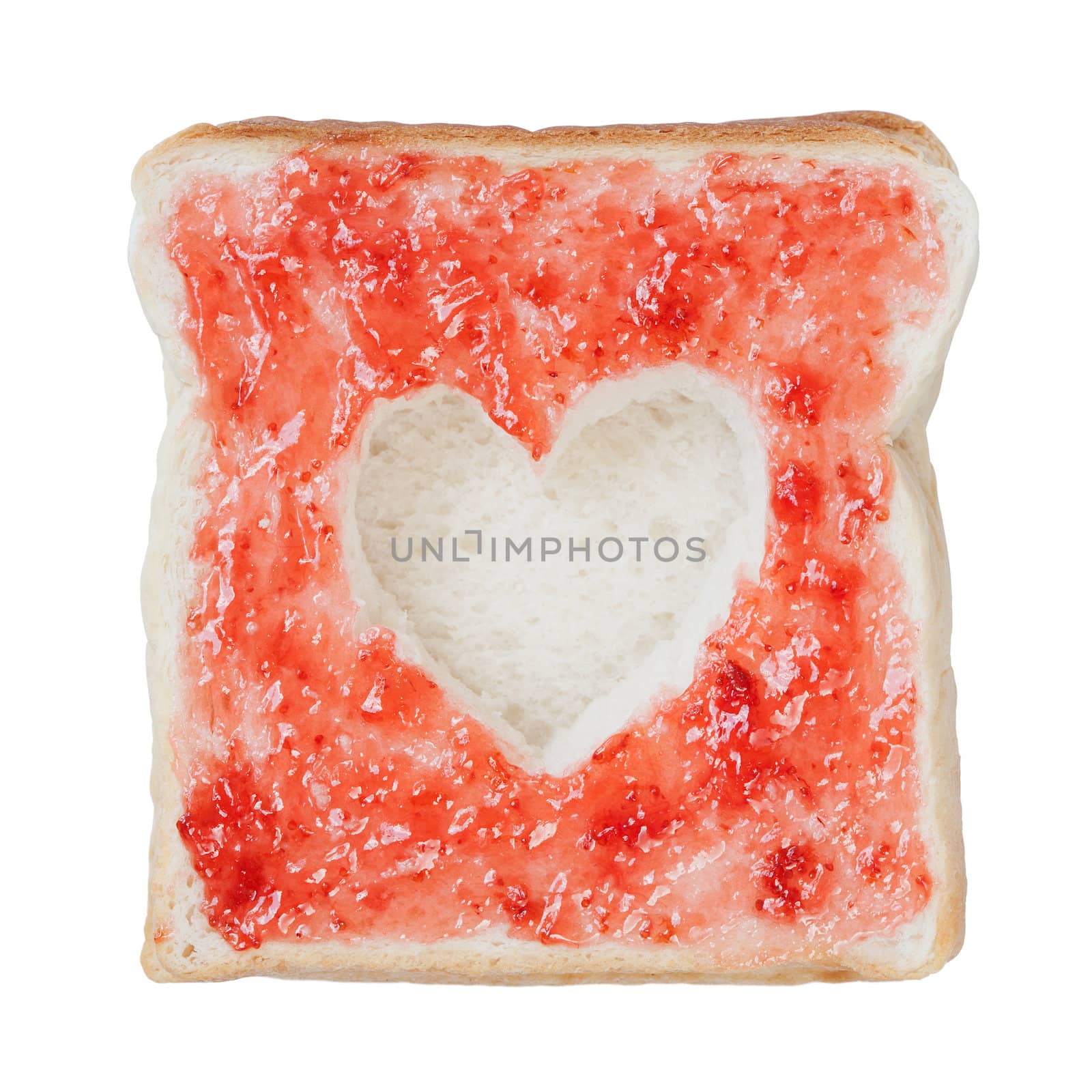 Slice of bread with fruit jam heart shape