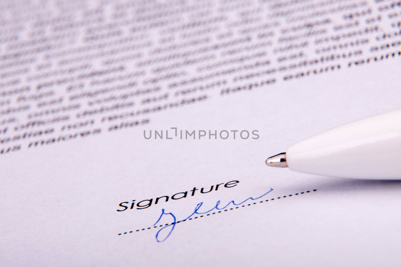 An image of signature over agreement