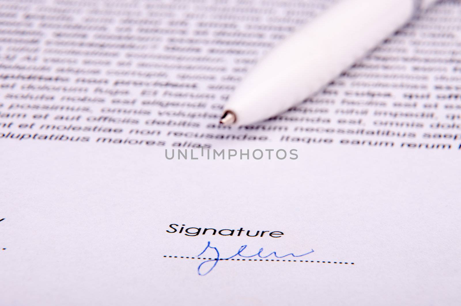 An image of signature over agreement