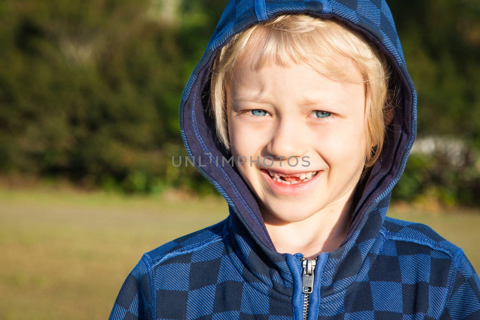 Portrait of boy with missing teeth by Jaykayl