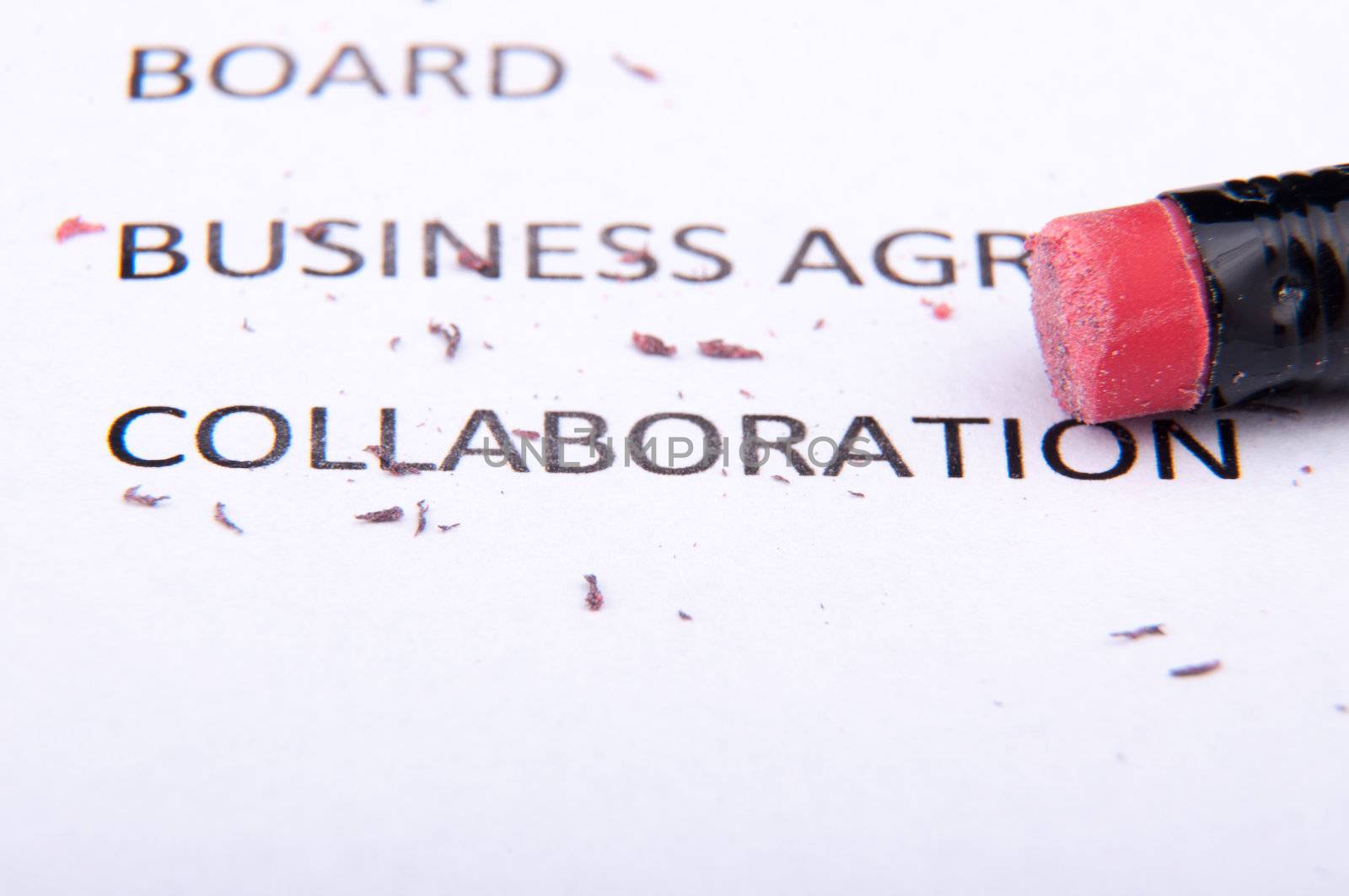 An image of business words and pencil
