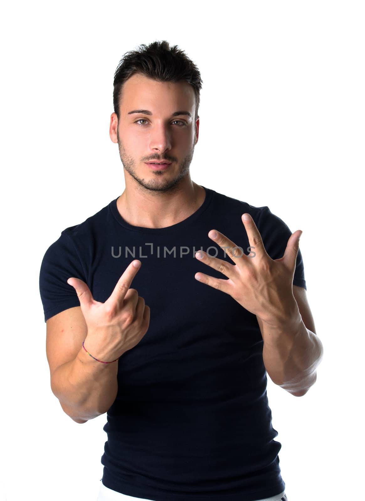 Attractive young man counting to seven with fingers and hands, isolated on white background