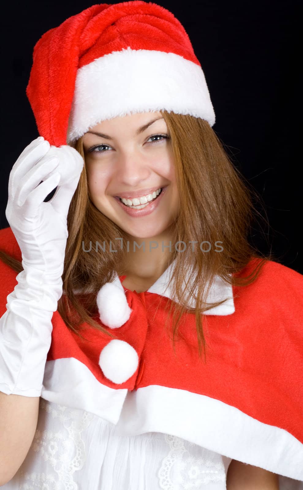 A woman enjoys a holiday in santa clothing