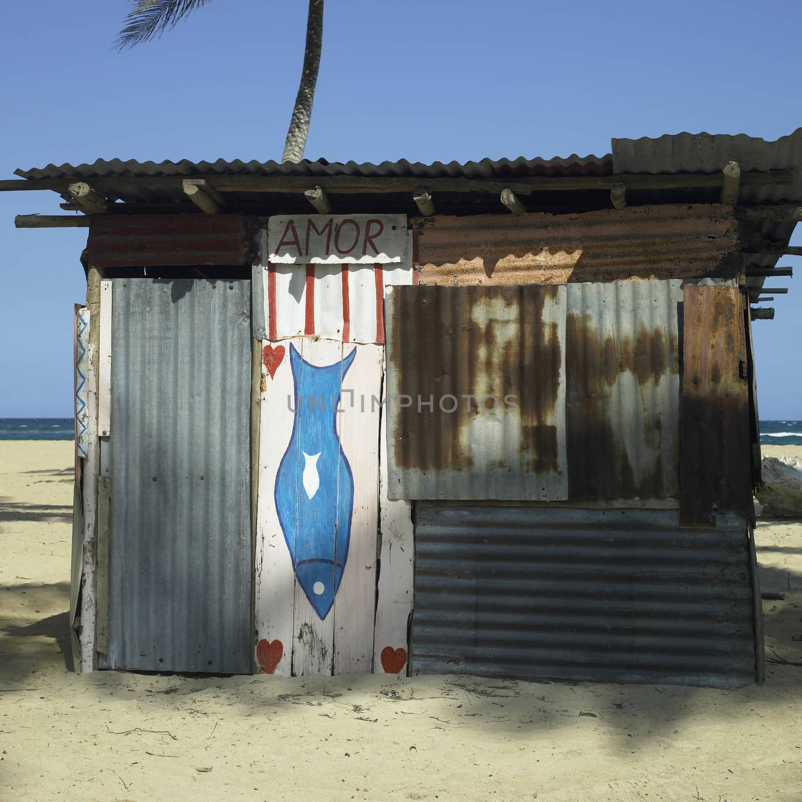 Closed fish shack on a tropical beach