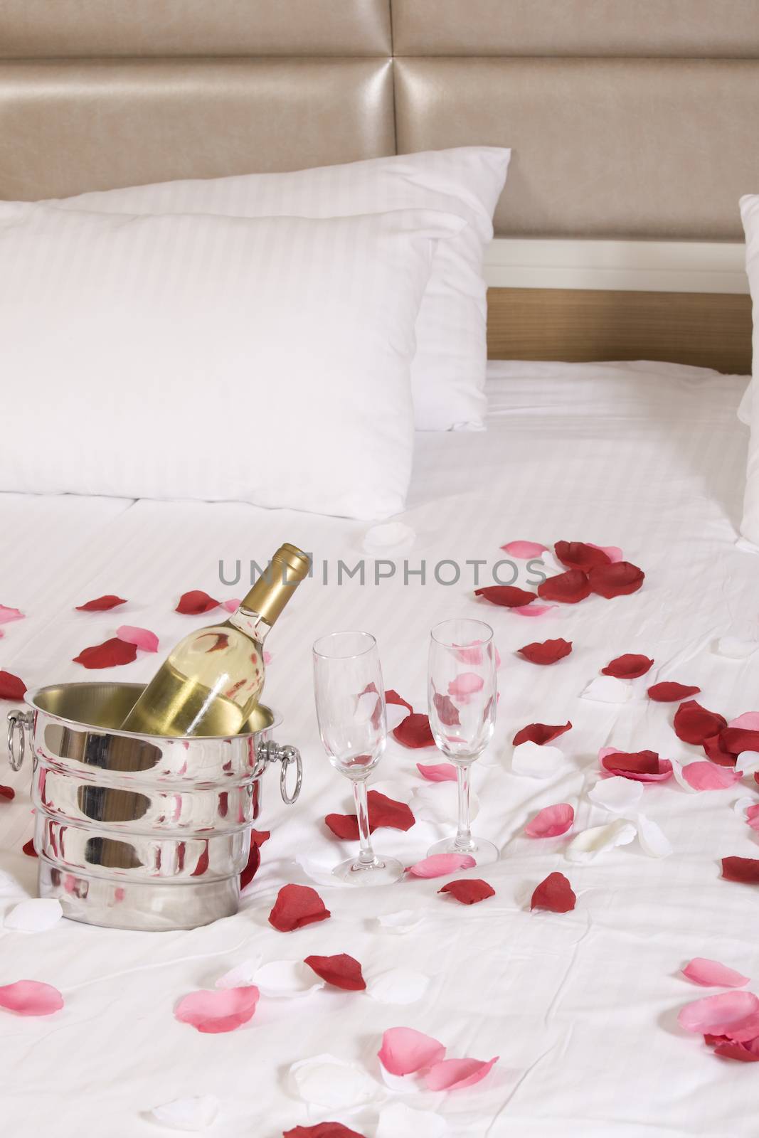 wine in bed to celebrate Valentine's Day at hotel room